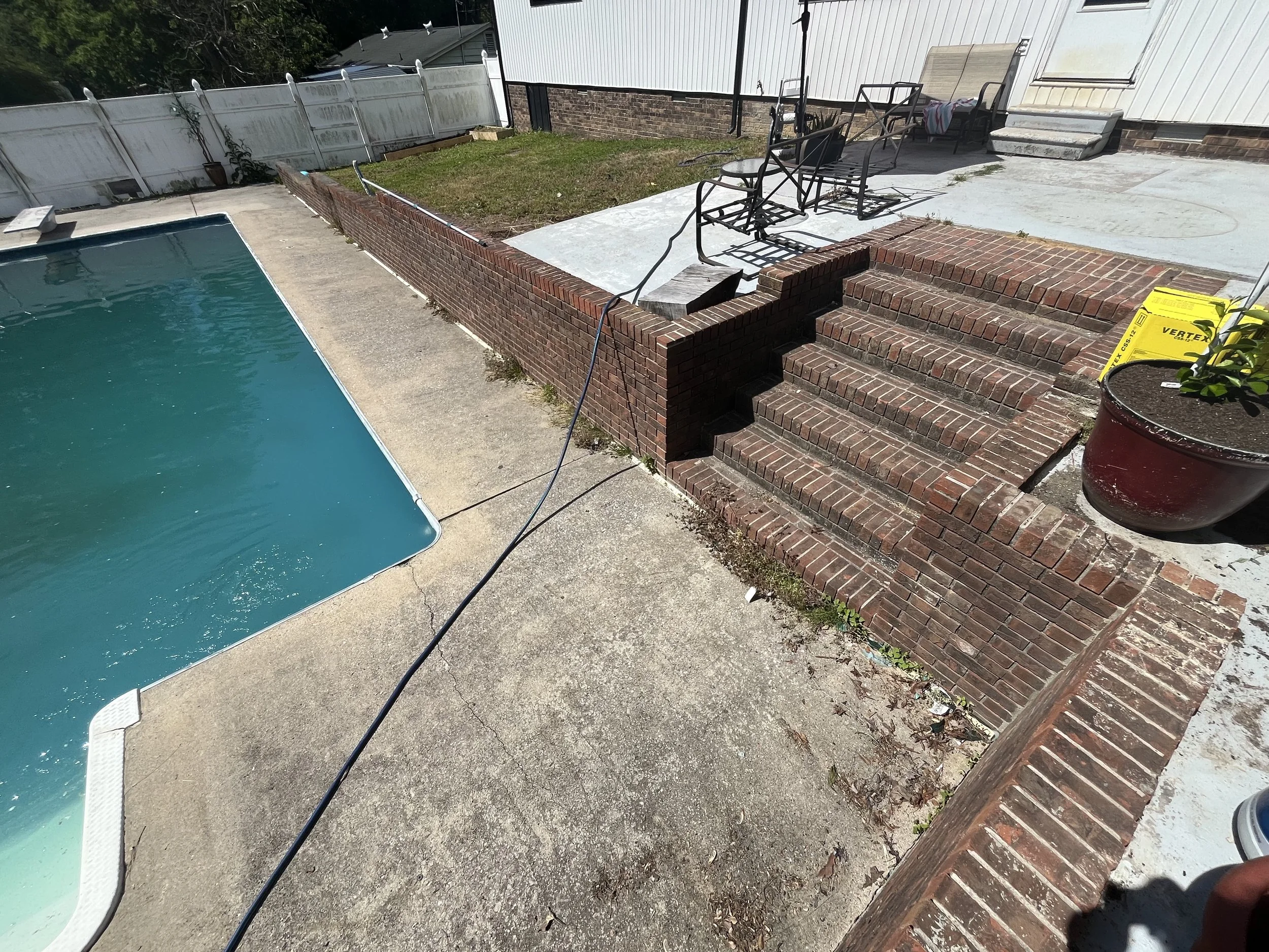 before pressure washing a pools concrete in Dalton GA, grime and dirt build up needs to be washed