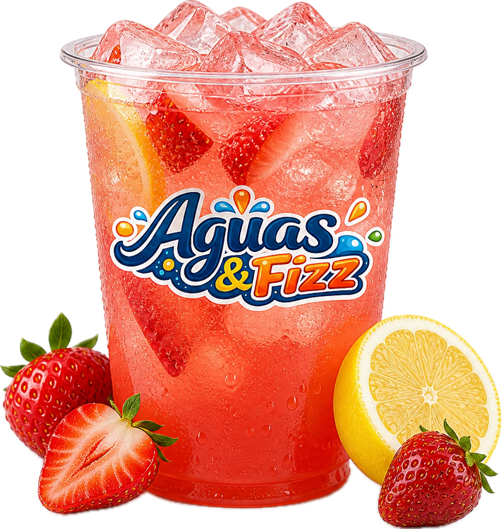 A clear plastic cup filled with strawberry and lemon flavored drink, ice cubes, and slices of strawberries and lemon, labeled Agüas & Fizz, with whole and sliced strawberries and a lemon half placed beside it.