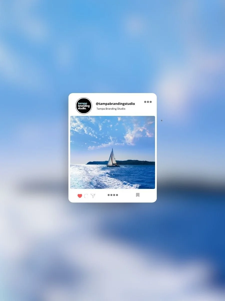 A digital illustration of a social media post showing a sailboat on the water with a distant shoreline, under a blue sky with scattered clouds.