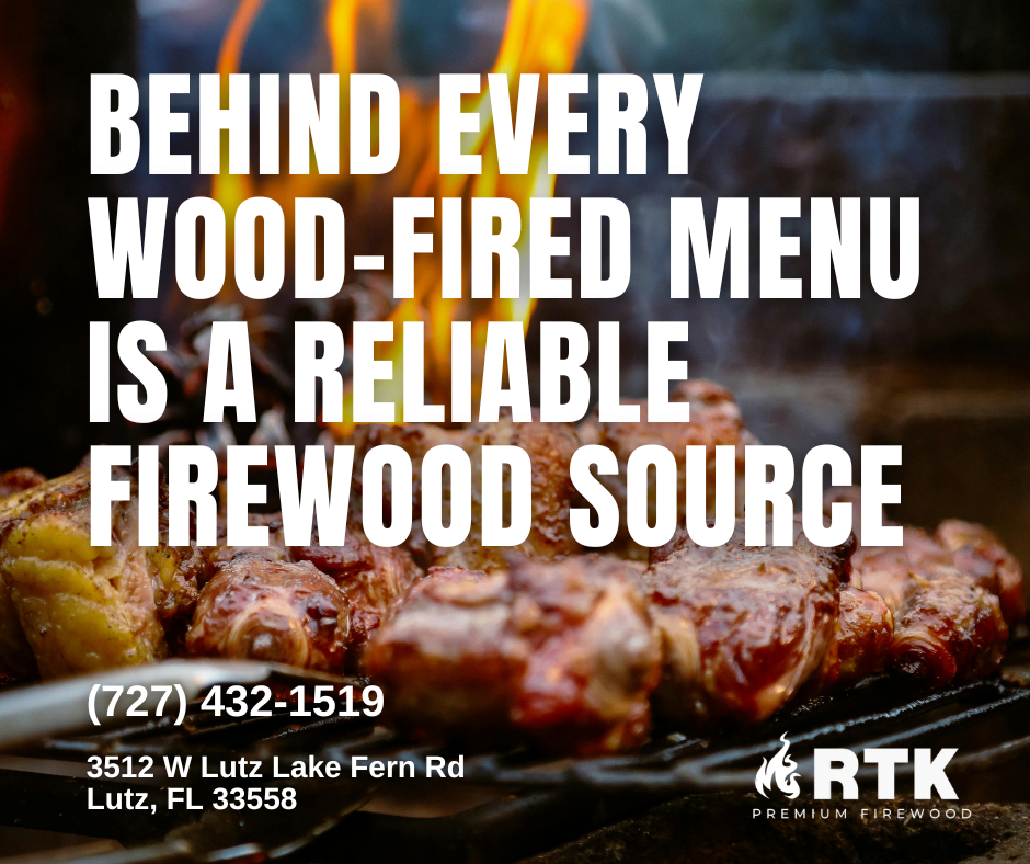 Close-up of meat grilling on a wood-fired barbecue with flames in the background, promoting RTK premium firewood for wood-fired cooking.