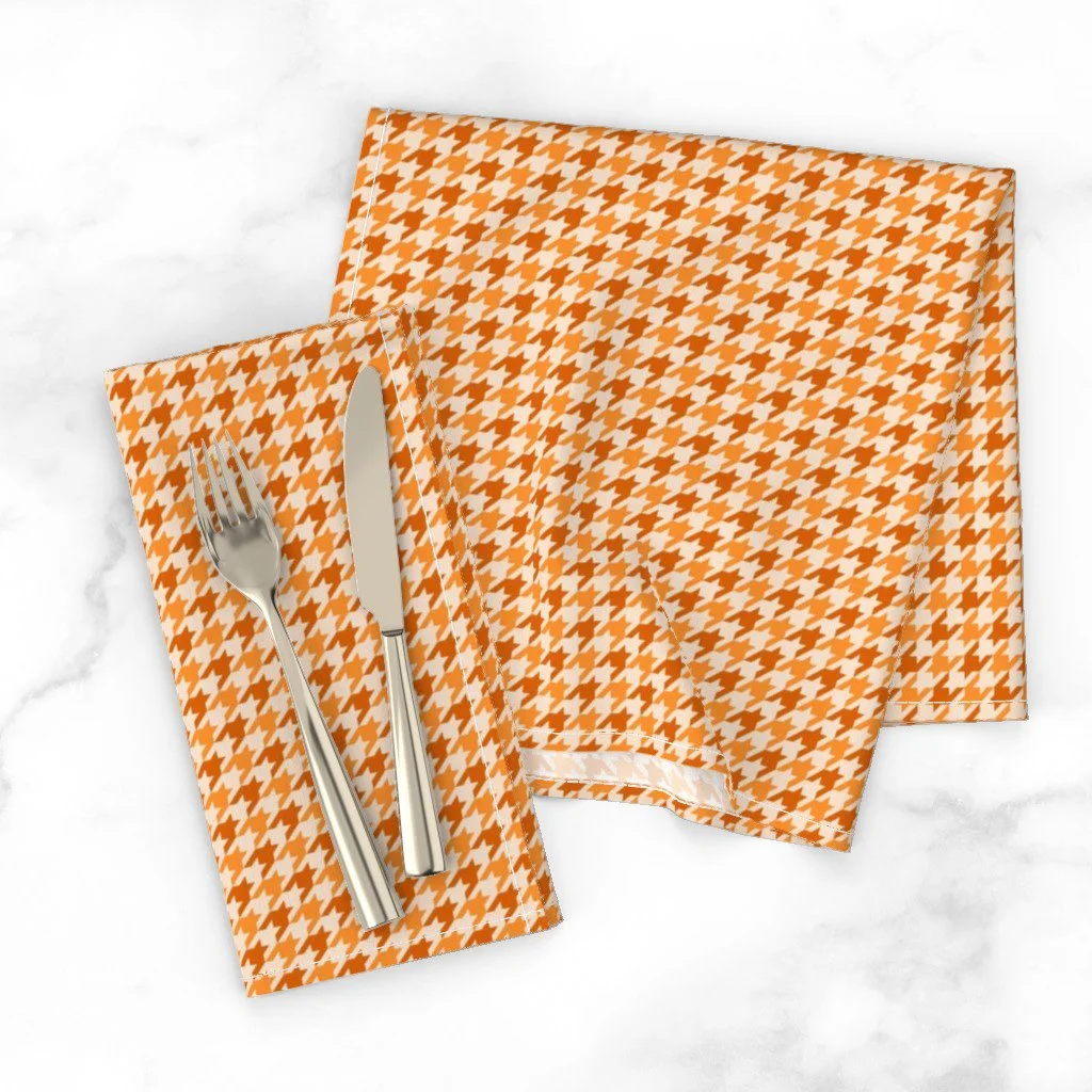 Houndstooth napkins from the Autumn Rainbows collection by Sue Ivy Designs in burnt orange and tangerine orange — fall table linens on Spoonflower.