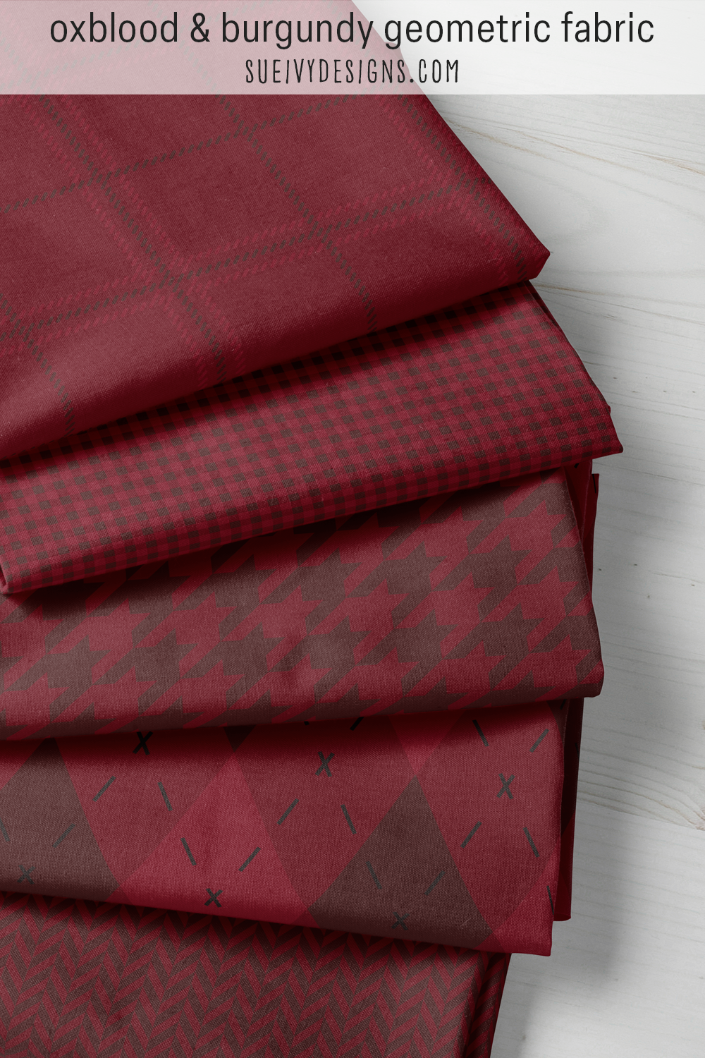 Five coordinating prints in oxblood and burgundy — argyle, plaid, houndstooth, herringbone, and gingham