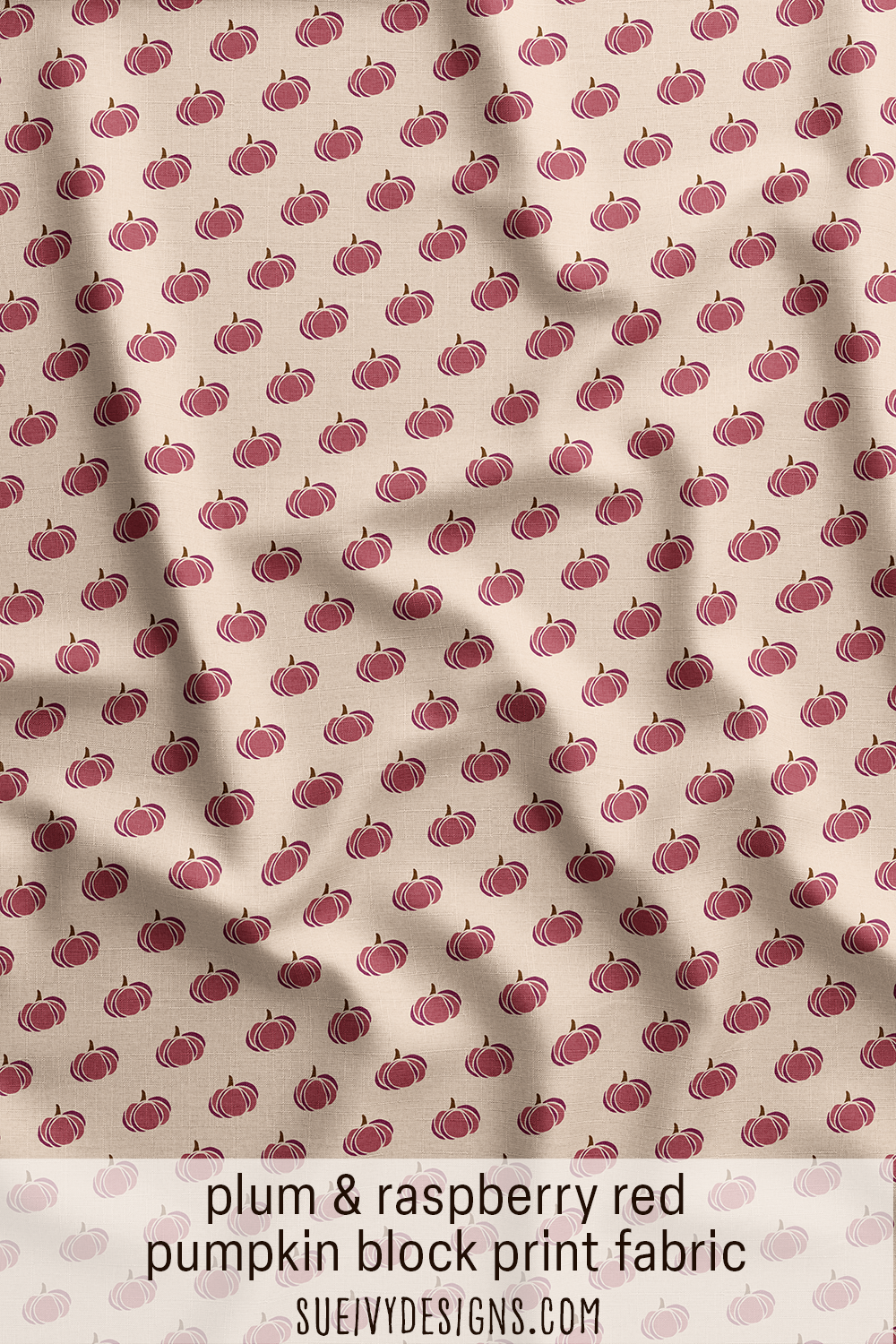 Pumpkin block print fabric from the Autumn Rainbows collection by Sue Ivy Designs in plum and raspberry red on warm cream.
