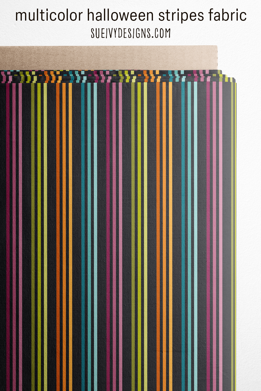 Multicolor stripes on black fabric wrapped around a bolt, for fun Halloween sewing.