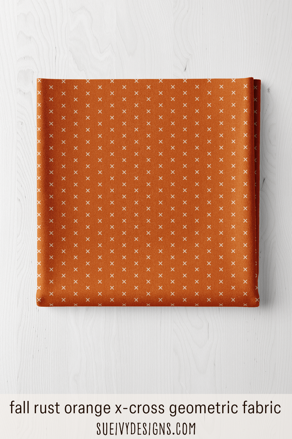 A single fat quarter of the x-cross geometric fabric in rust orange, a fall and Halloween blender.
