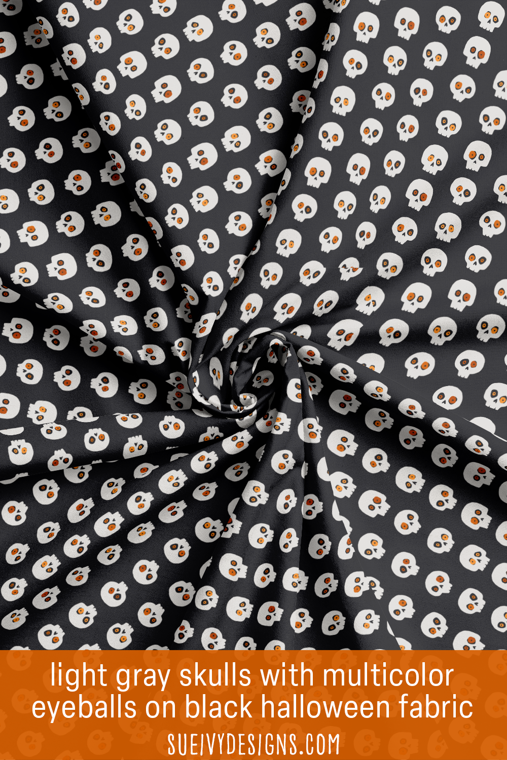 Light gray skulls with eyeballs on black Halloween fabric from the Spooktacular collection by Sue Ivy Designs