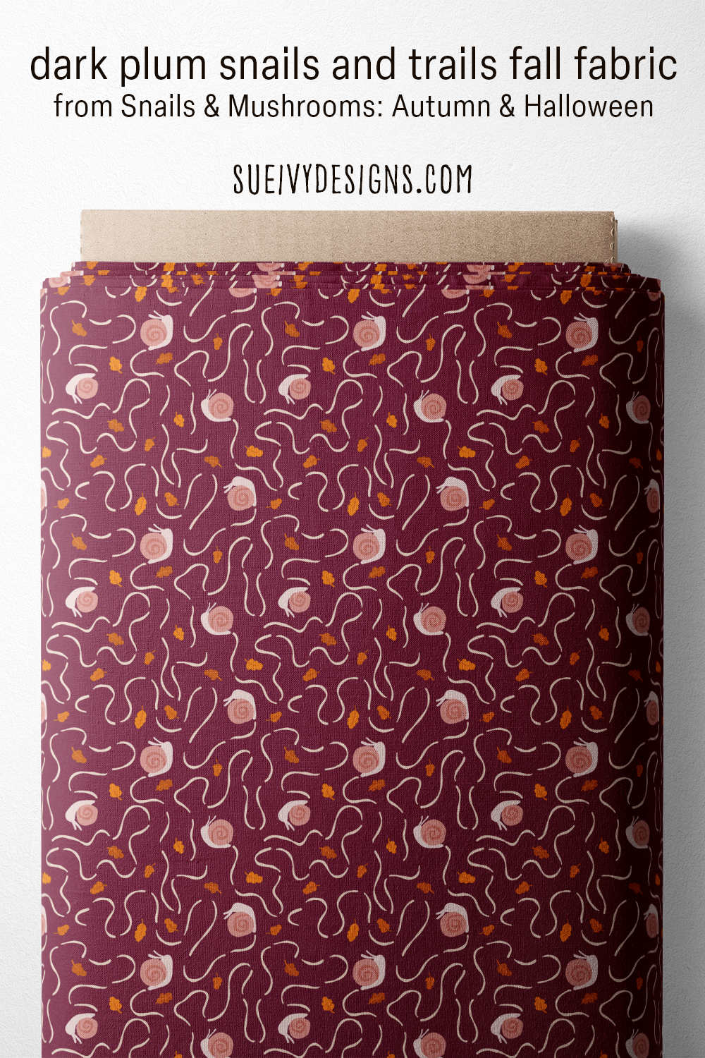 Dark plum snails and trails fall quilting fabric from the Snails & Mushrooms autumn collection by Sue Ivy Designs, with curling snail trails and scattered leaves.