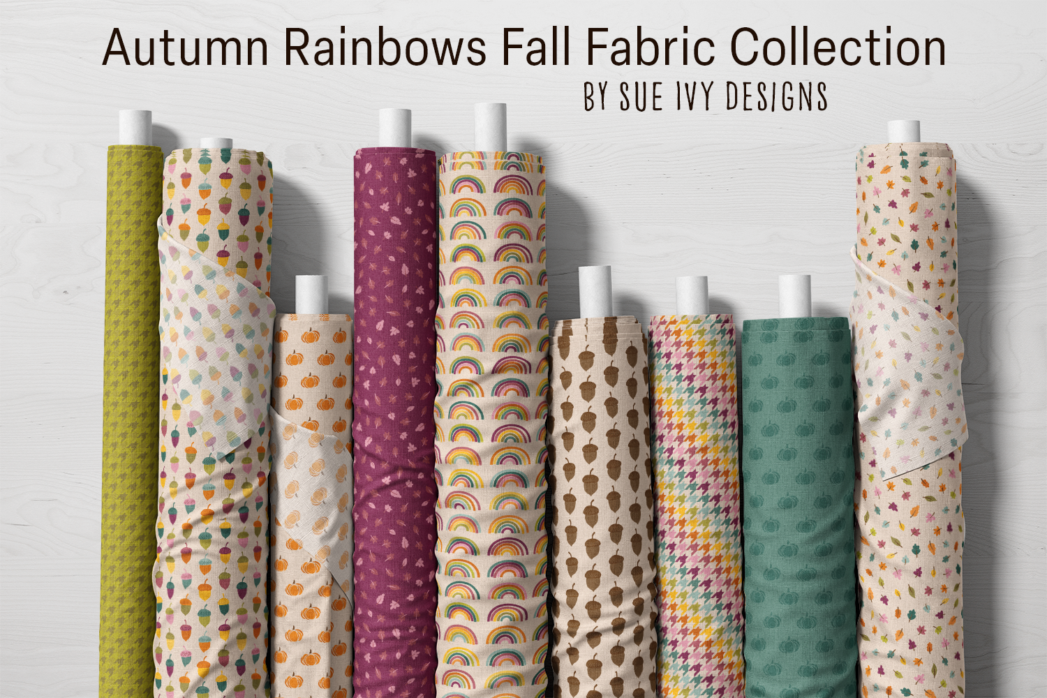 Autumn Rainbows fall fabric collection by Sue Ivy Designs — colorful quilting and apparel fabric featuring rainbows, acorns, pumpkins, scattered leaves, and houndstooth.