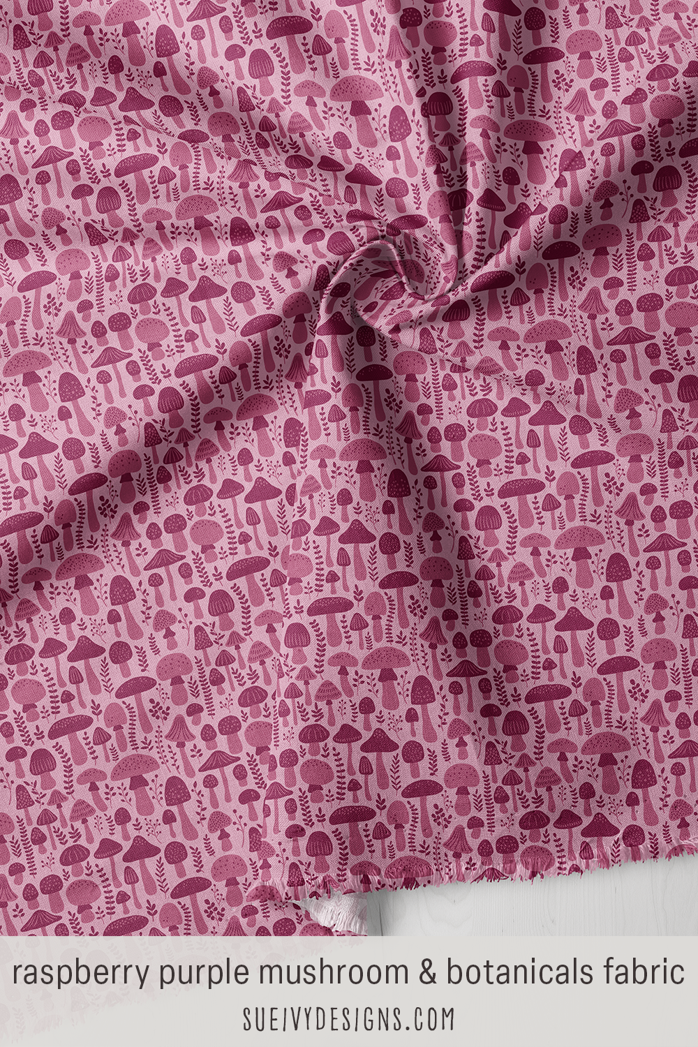 Color-on-color botanical mushrooms, dark raspberry purple on pale pink-purple quilting fabric.