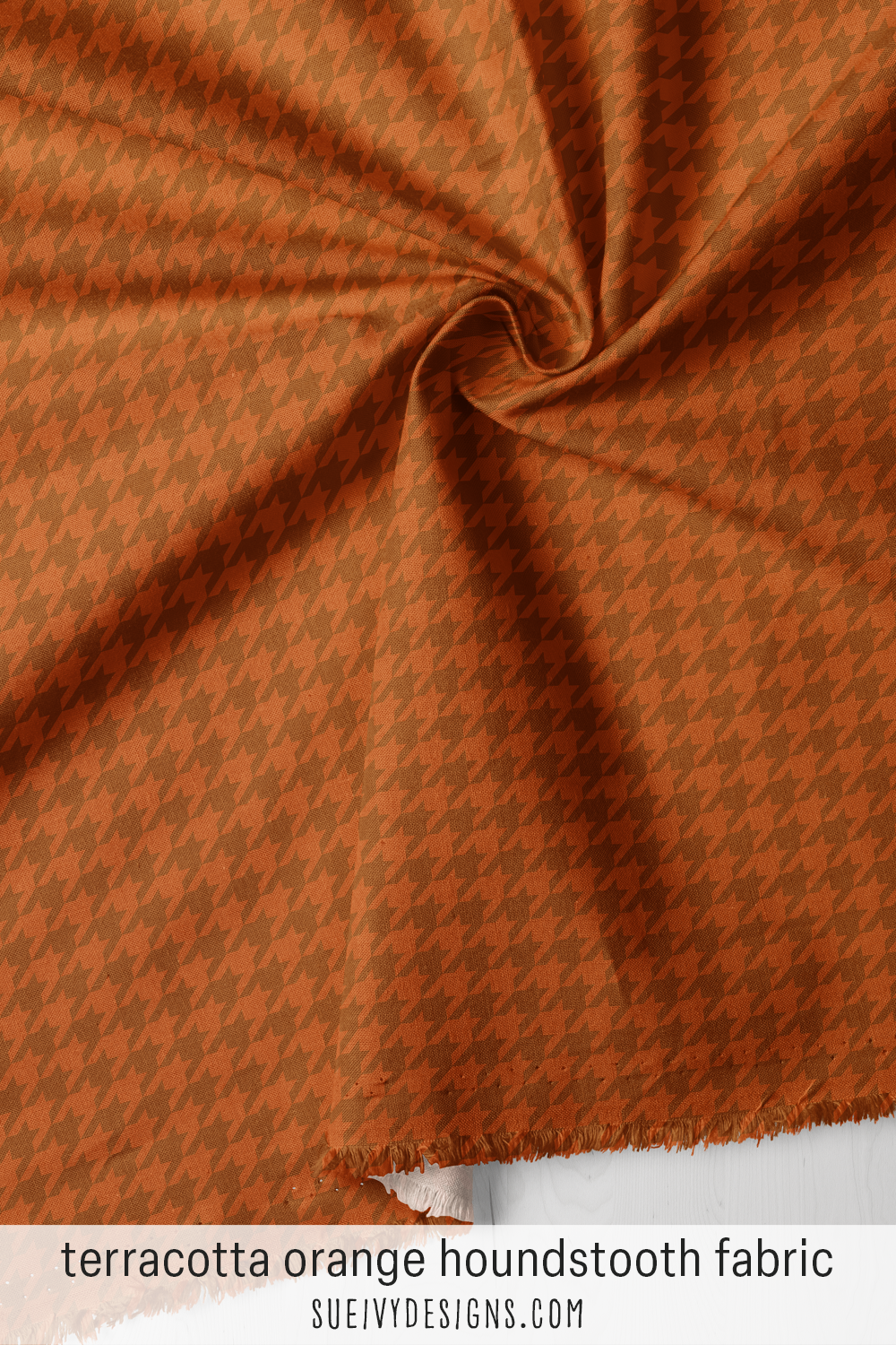 Terracotta orange houndstooth — large vector check with tonal contrast — apparel fabric