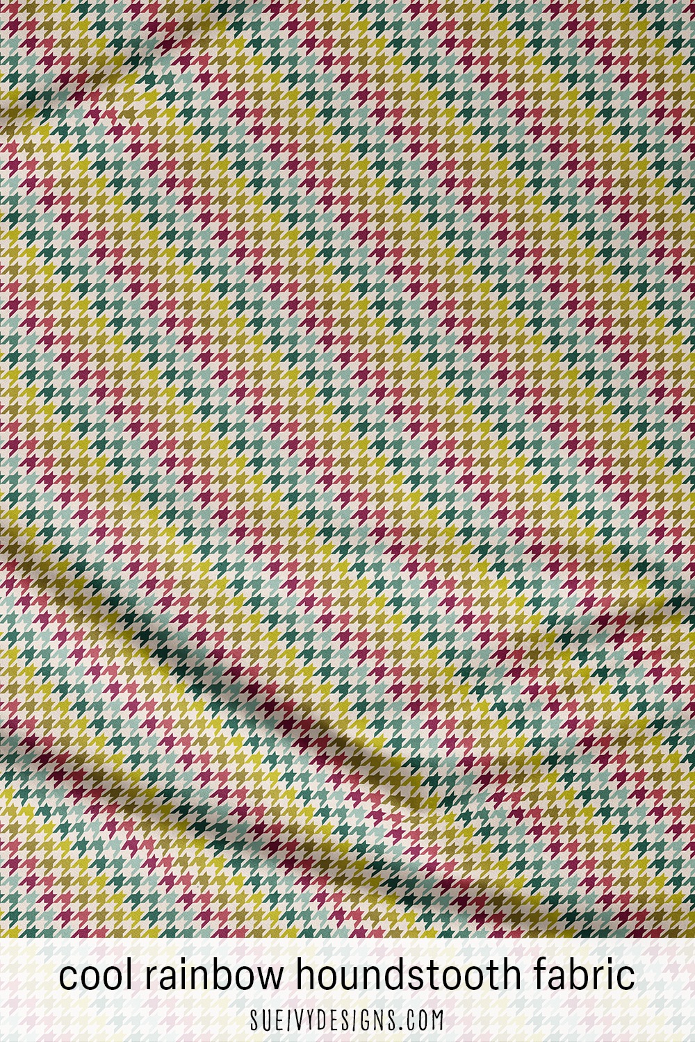 Cool rainbow houndstooth fabric from Autumn Rainbows, forming diagonal stripes in greens and teals with raspberry red and plum.