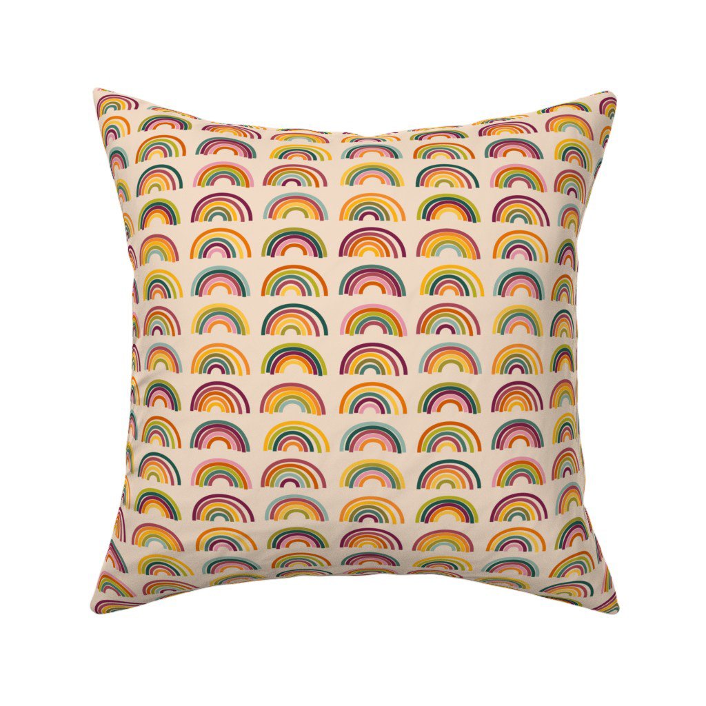 Throw pillow in the Autumn Rainbows rainbow print by Sue Ivy Designs — warm autumn rainbows on warm cream, on Spoonflower home decor.