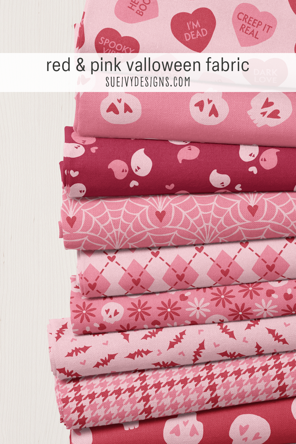 Creep it real conversation hearts topping a stack of ruby red and peachy pink prints, for a coquette Valentine's apron