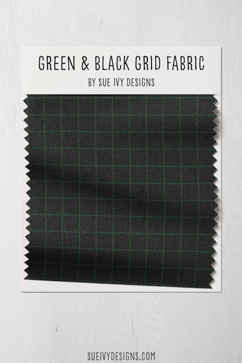 Green and black grid fabric — dark Christmas green stitch-marks over a jet black ground, a deep tattersall blender for quilting.