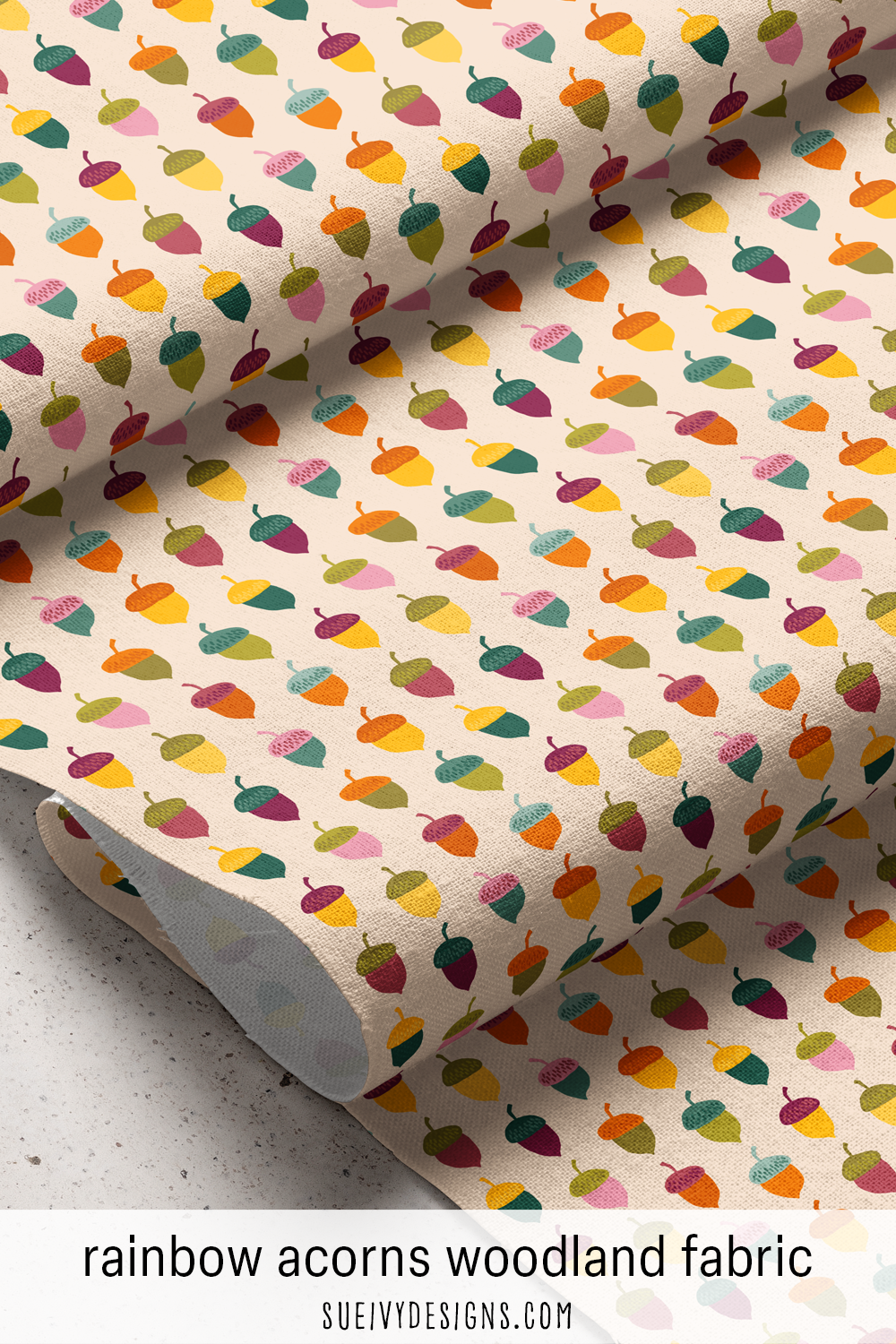 Hand-drawn woodland acorns in a warm autumn rainbow, multicolor fall sewing fabric.