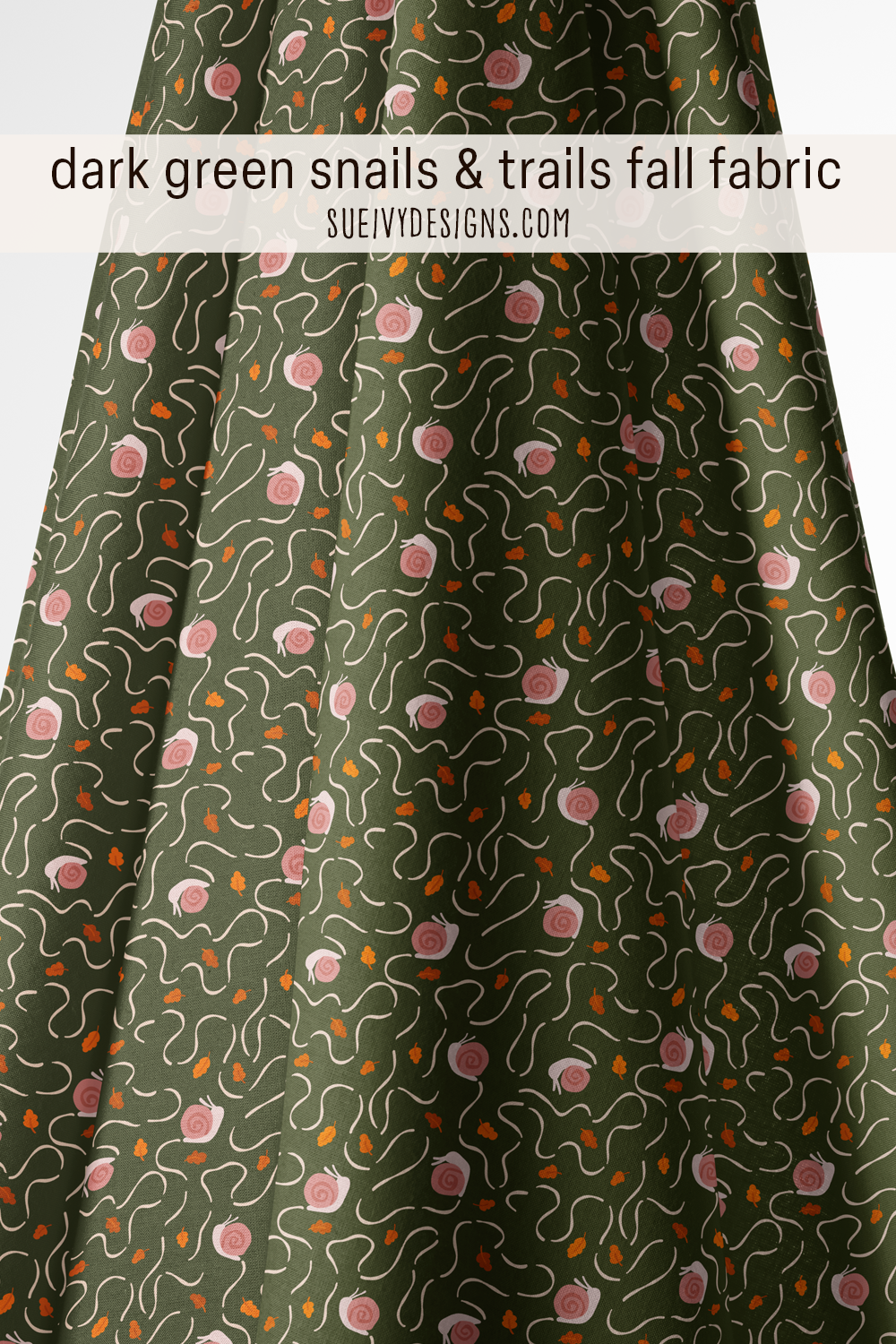 Woodland snails and trails fabric on a dark green ground.