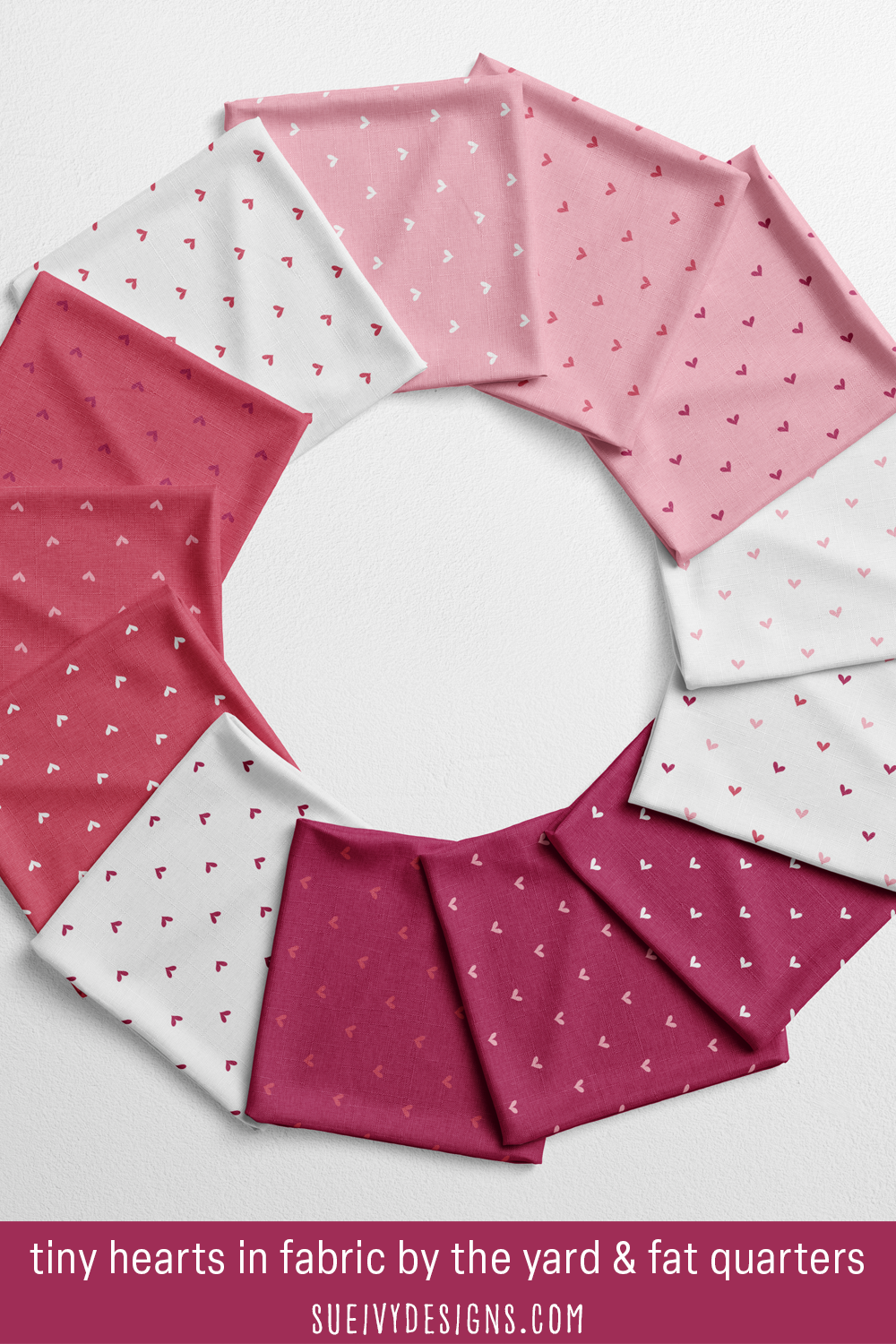 A wreath of fat quarters: tiny hearts in all thirteen colorways, from multicolor on white to white on raspberry purple, for Valentine fabric crafts.