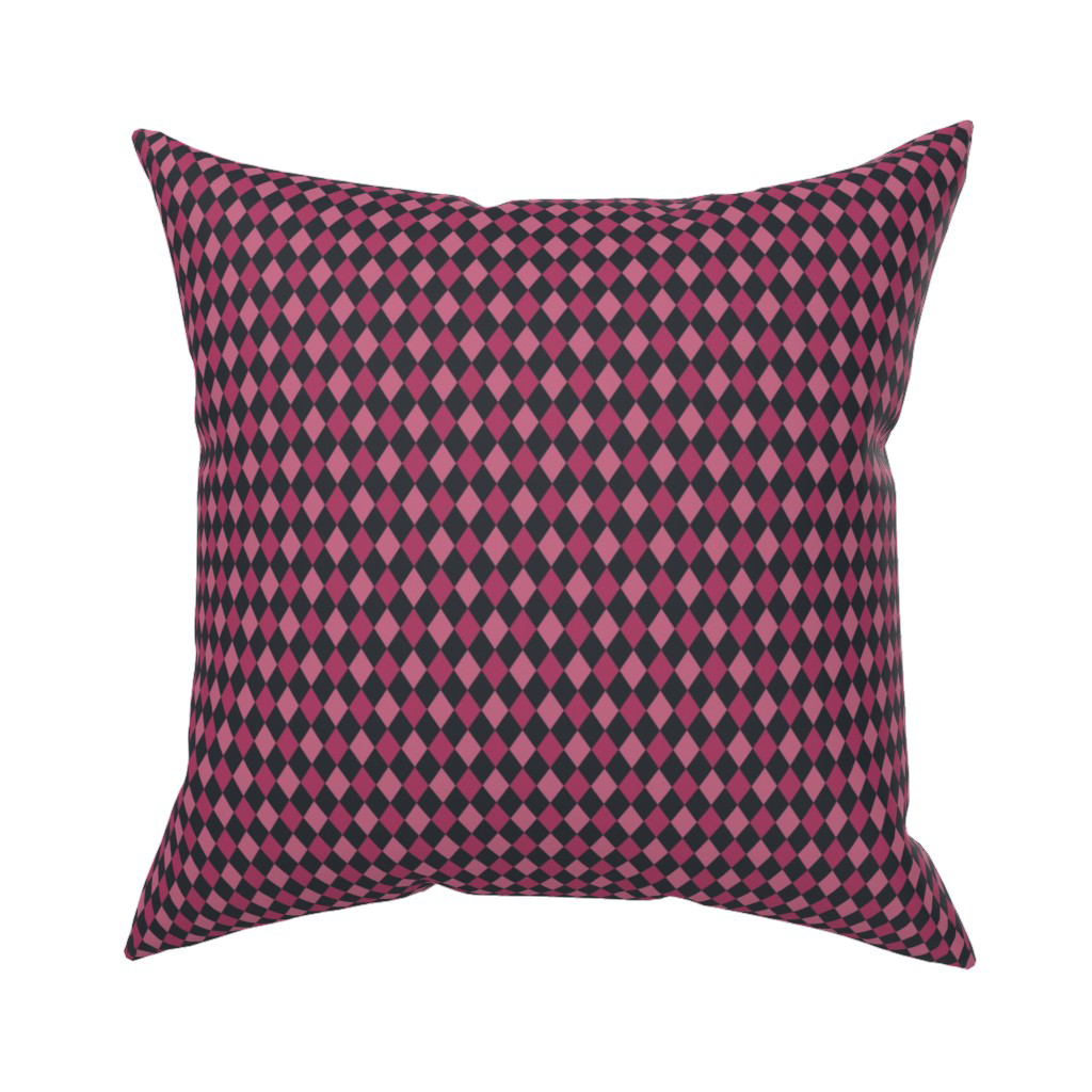 Harlequin Halloween throw pillow in raspberry purple and black, ready to order from Spoonflower in the Spookilicious collection.