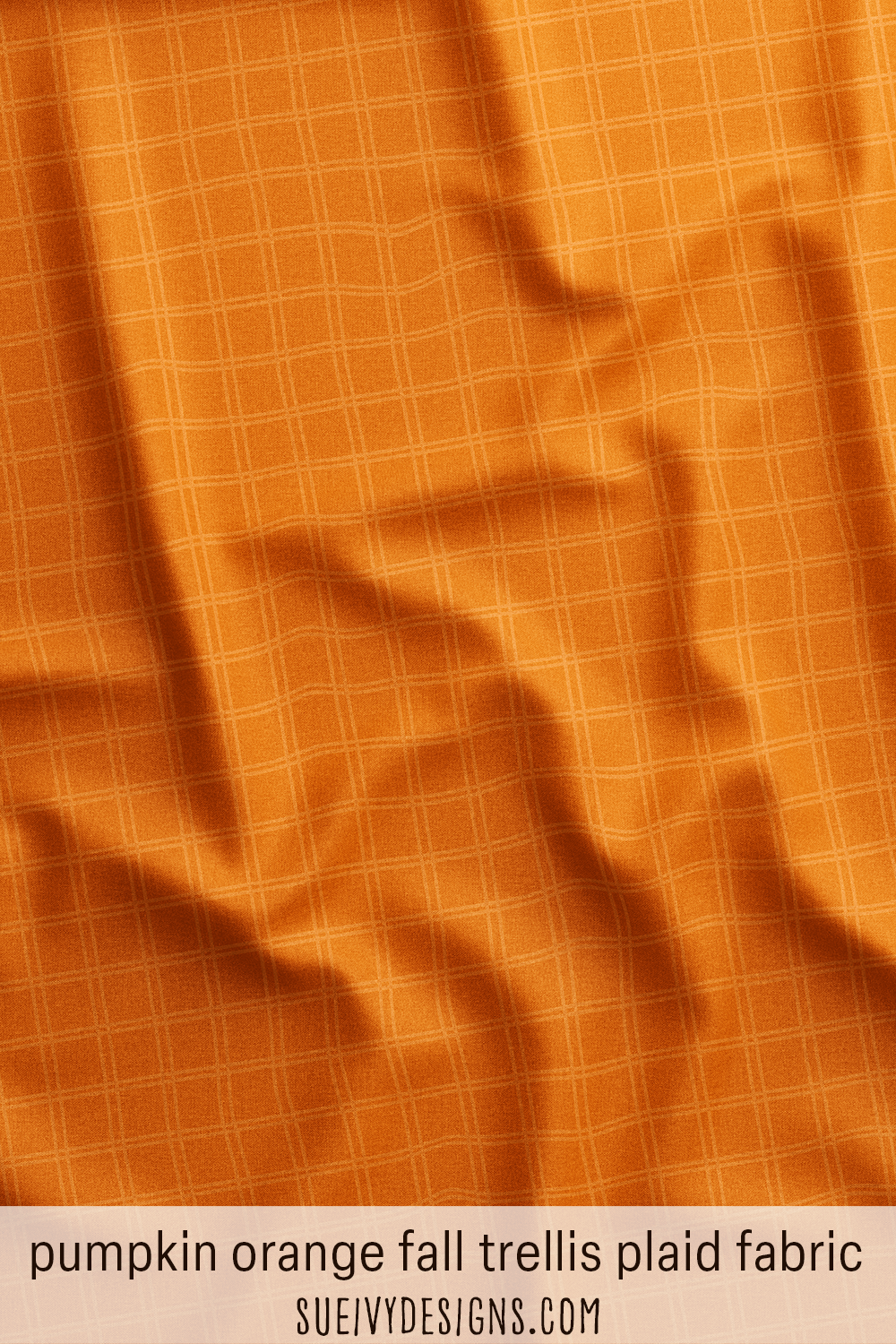 Wide trellis plaid fabric in pumpkin orange — a tonal blender from Snails & Mushrooms: Autumn & Halloween.