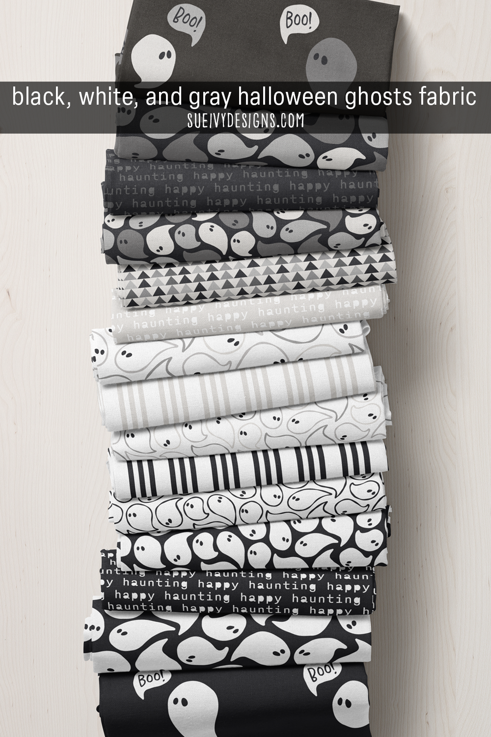 Ghosts, stripes, and triangles in black, white, and gray — the Happy Haunting collection in a black-and-white Halloween palette, with white ghosts and 'happy haunting' text.