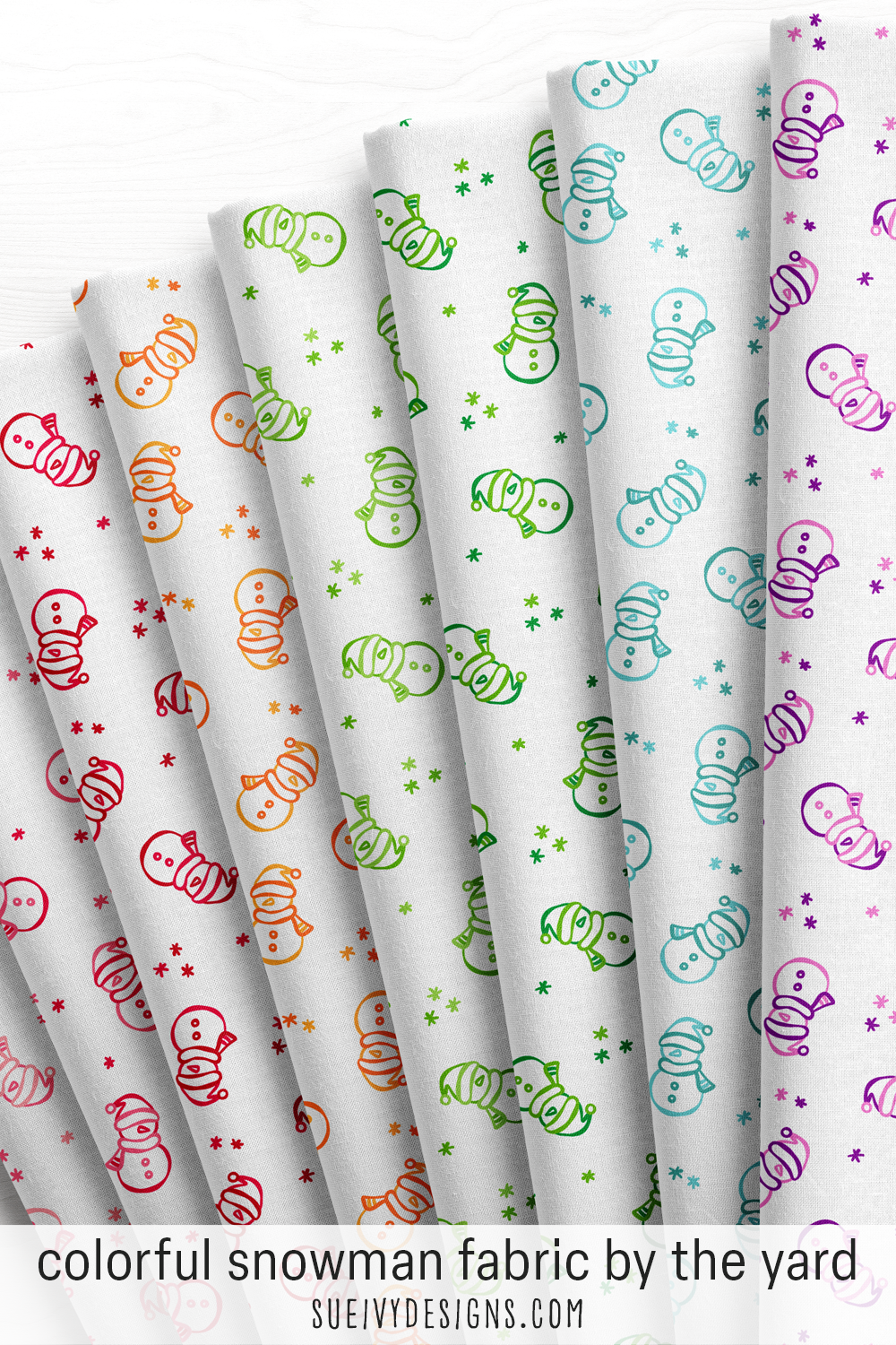 Snowman fabric in eight colorways — doodled snowmen tossed with snowflakes on white, from pink through gold, green, teal blue, and purple.