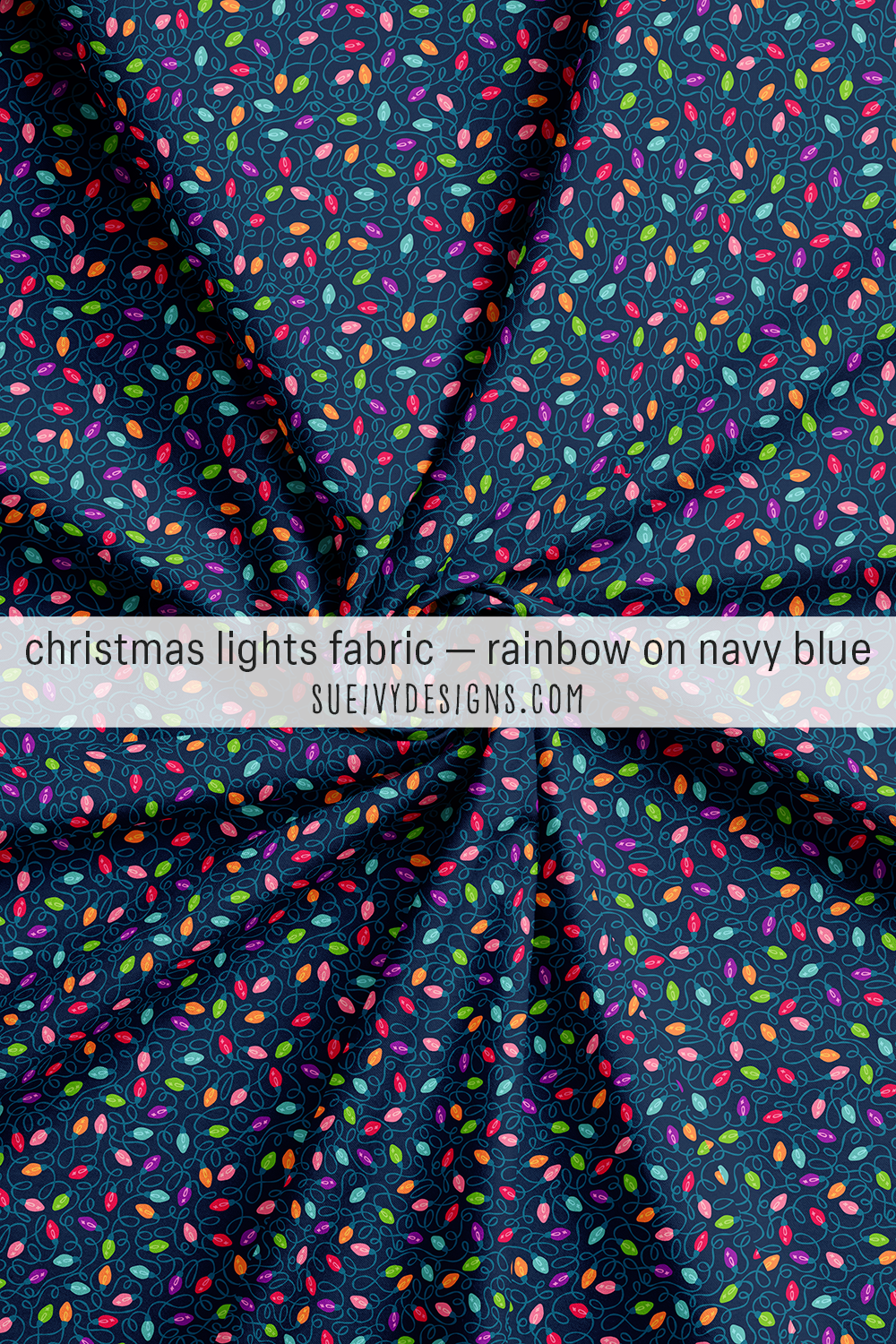 Rainbow string lights swirled on navy — twinkle-light bulbs across the deep blue, for holiday quilting and tree skirts.