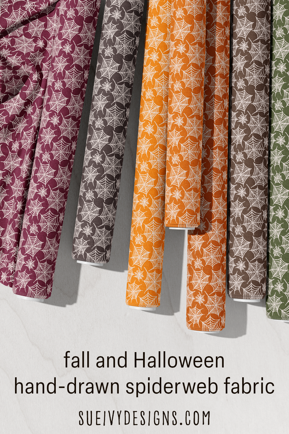 Fall and Halloween hand-drawn spiderweb quilting fabric from the Snails & Mushrooms collection by Sue Ivy Designs, a blender print in several autumn colorways.