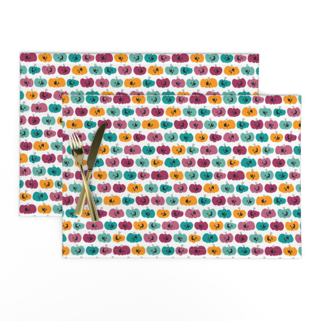 Multicolor jack-o'-lantern pumpkin placemats, ready-made from Spoonflower in the Spookilicious collection.