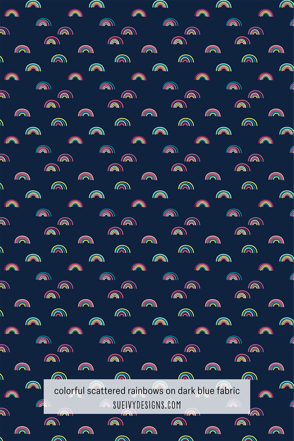 Scattered rainbow fabric print in multicolor on navy blue by Sue Ivy Designs, perfect for quilting and apparel