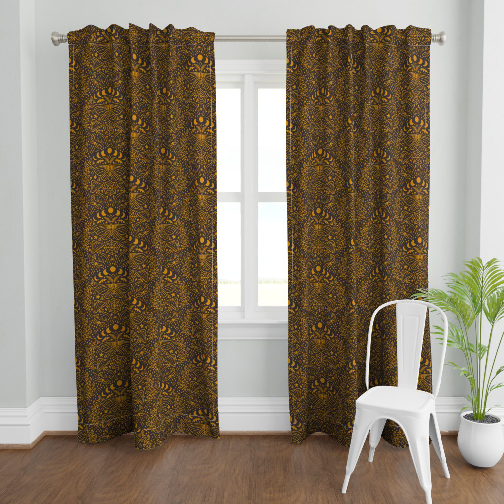 Black and gold moth & mushroom damask curtains, a moody Halloween window treatment for a witchy living room.