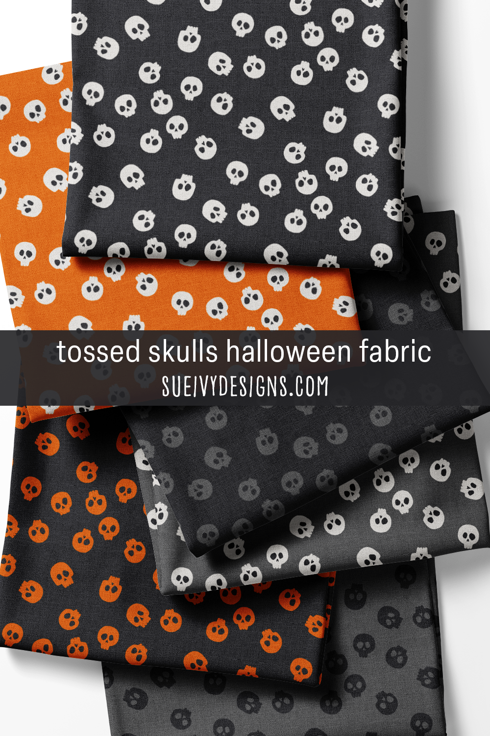 Tossed skulls Halloween quilting fabric from the Spooktacular collection by Sue Ivy Designs