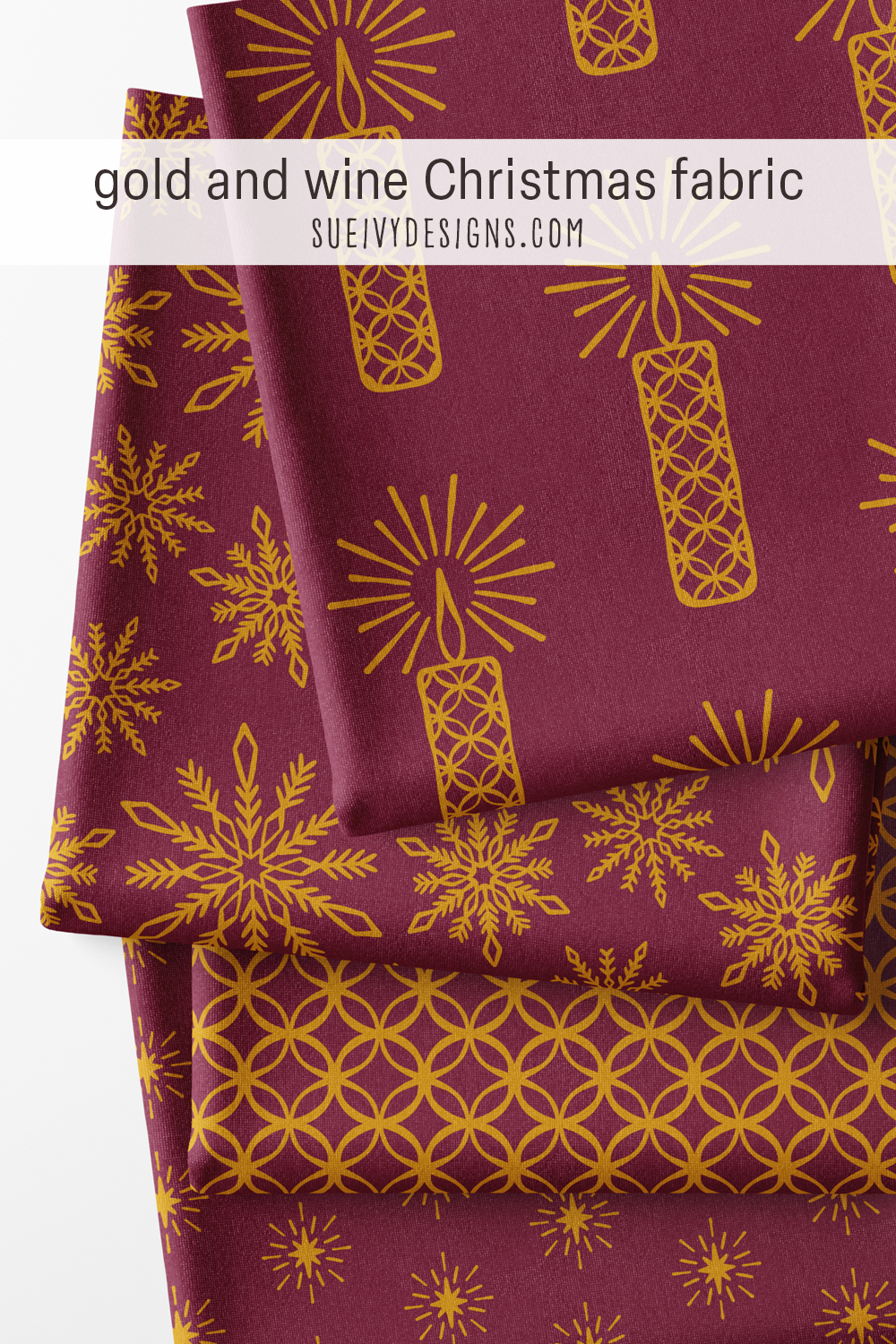 The whole wine-red colorway of Silent Night — candles, snowflakes, stars, and circles in gold on a deep ground — for stash matching.