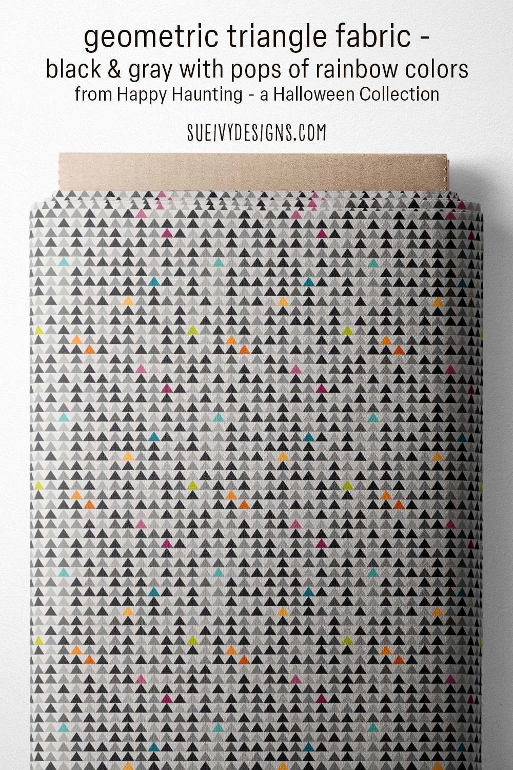 Black and gray triangle Halloween fabric with rainbow pops of color from the Happy Haunting collection by Sue Ivy Designs.