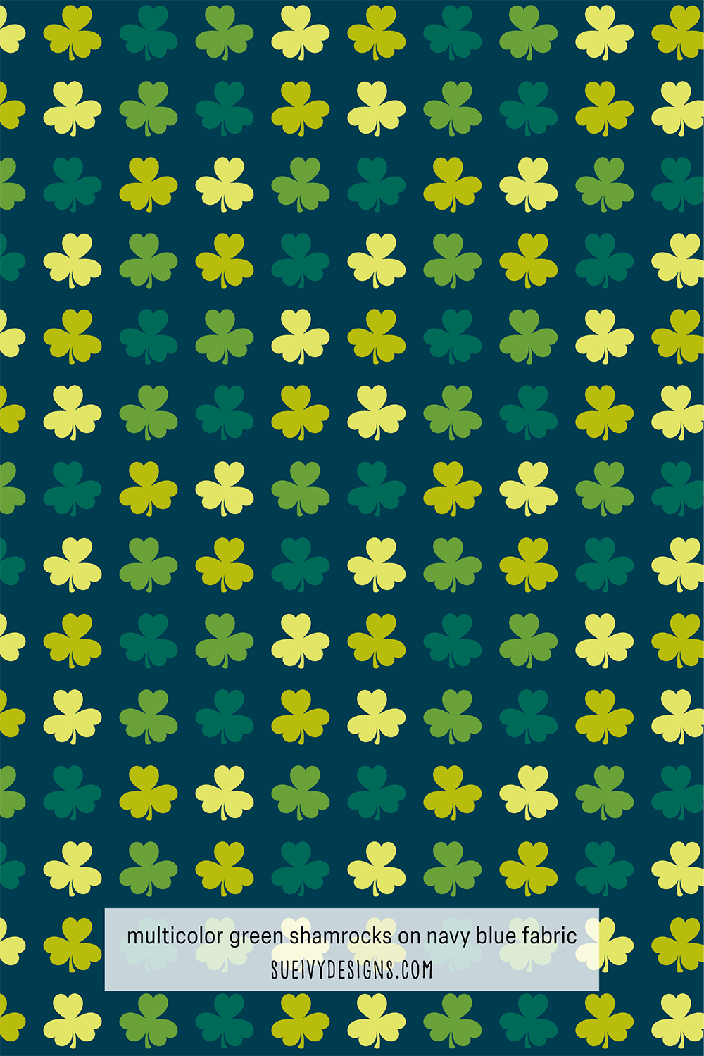 Multicolor green shamrock fabric print on navy blue by Sue Ivy Designs, perfect for quilting and St. Patrick's Day projects