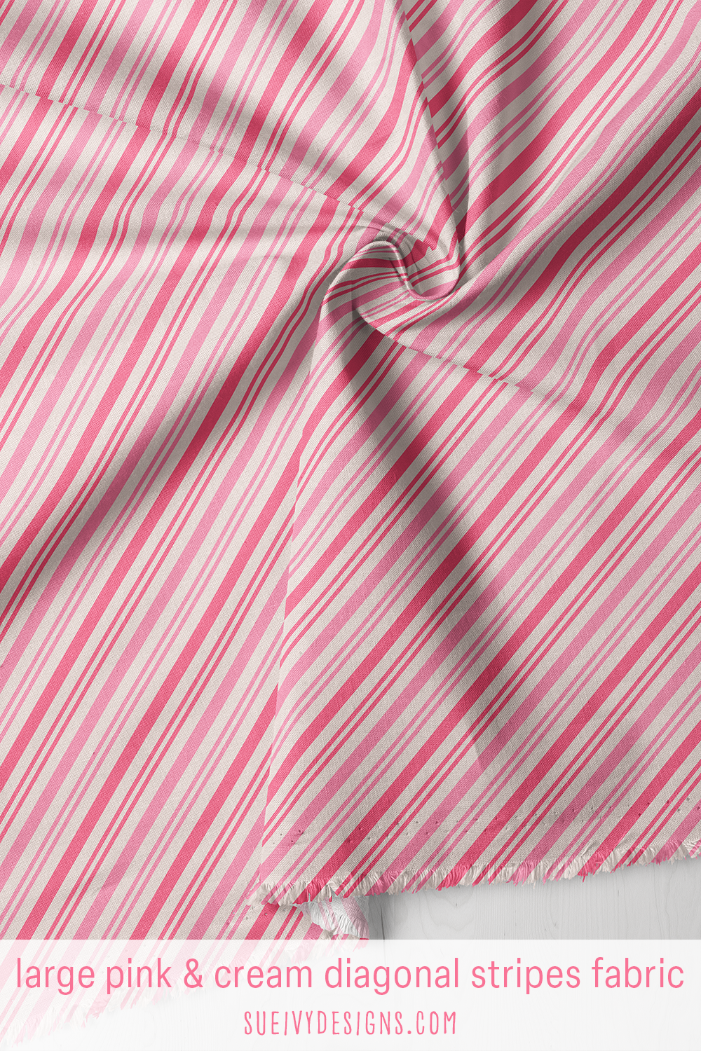 Large-scale candy-cane stripes in candy pink and cream — Christmas quilting fabric.