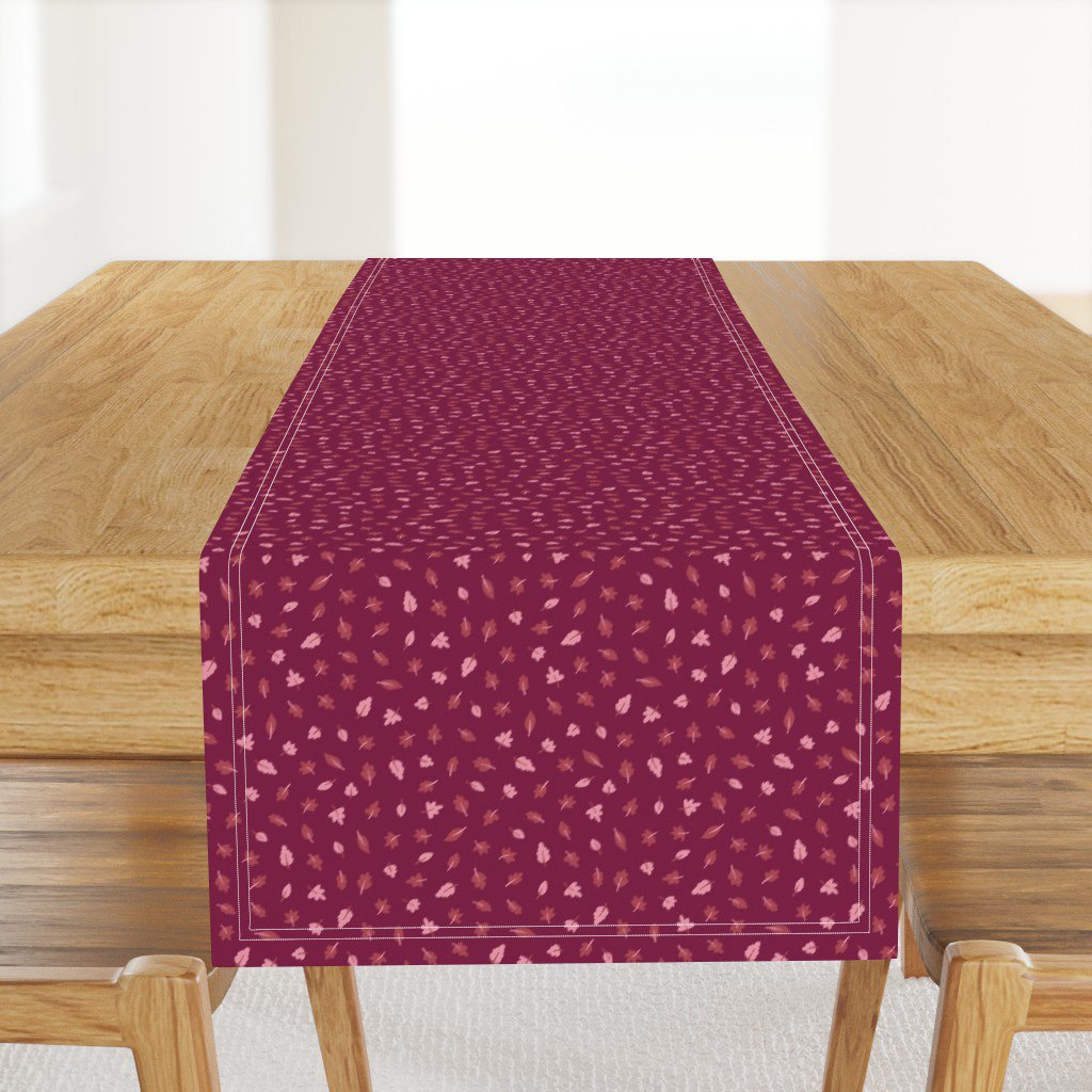 Plum fall leaves table runner from the Autumn Rainbows collection by Sue Ivy Designs — scattered autumn leaves on a deep plum ground, on Spoonflower.