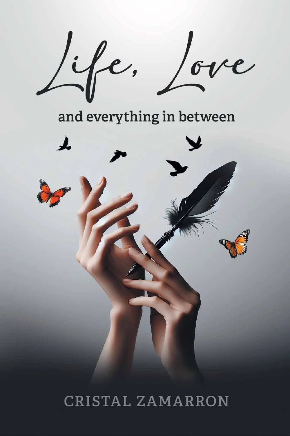 Book cover titled 'Life, Love and everything in between' by Cristal Zamarron, featuring a pair of hands holding a quill with black and white feathers, surrounded by color and black butterflies flying around.
