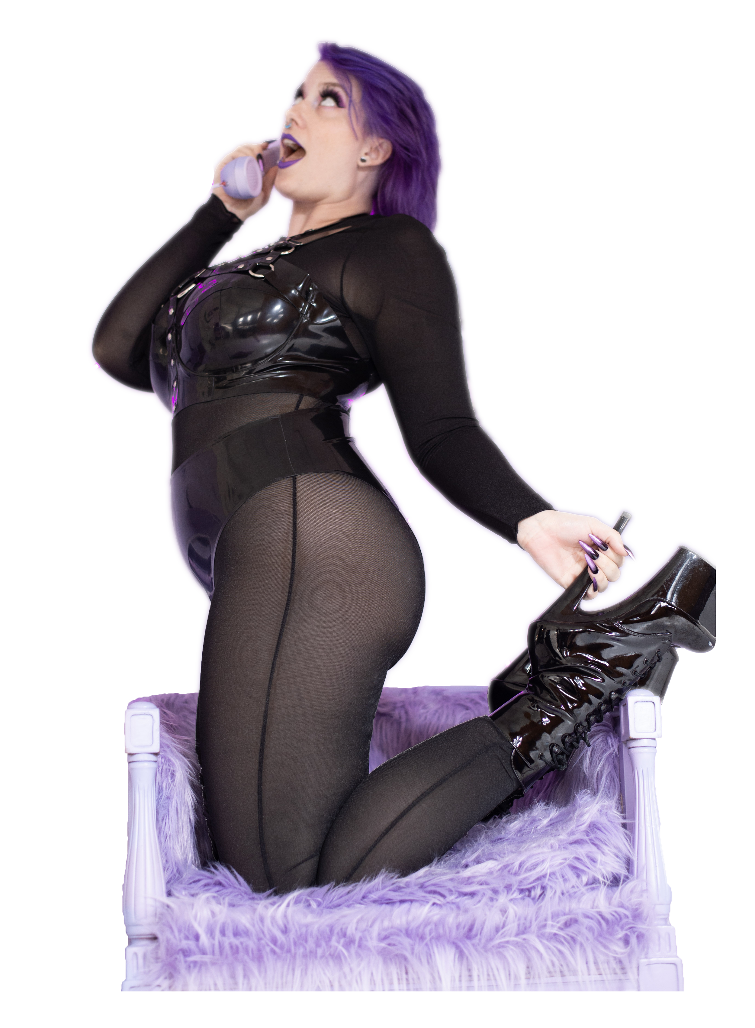 Goddess Nyx kneels on a purple chair, holding her high heel in one hand and a phone in the other, encouraging you to call or text her for your femdom fantasies