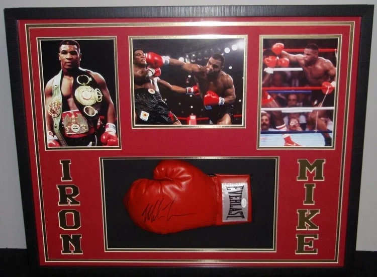 Framed display featuring a boxing glove autograph, three photographs of boxing matches, and the text 'Iron Mike.'  custom framing brookline pictureplacebrookline.com