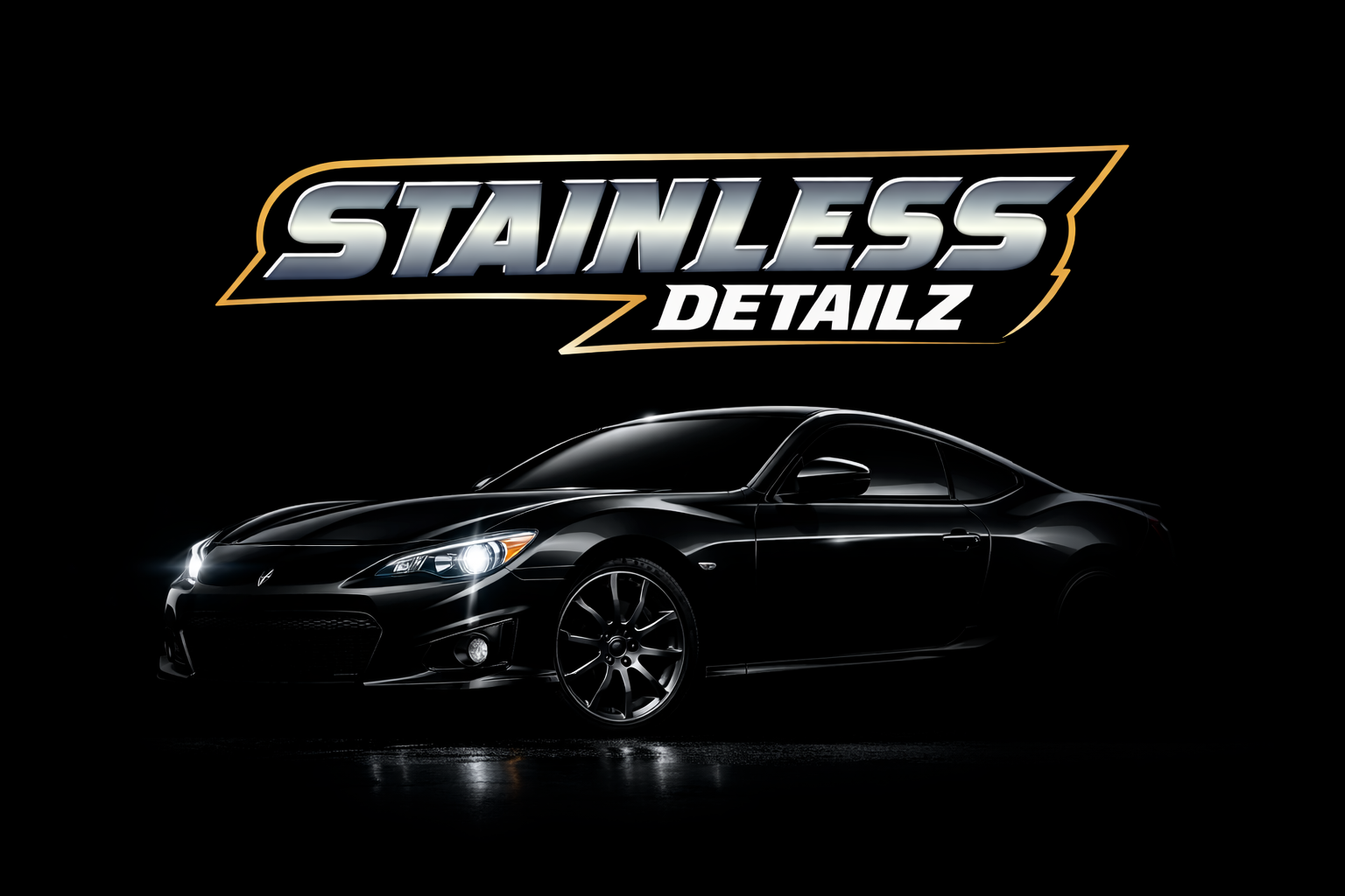 A sleek black car with shiny surfaces and modern design under a logo that reads 'Stainless Detailz' on a dark background.