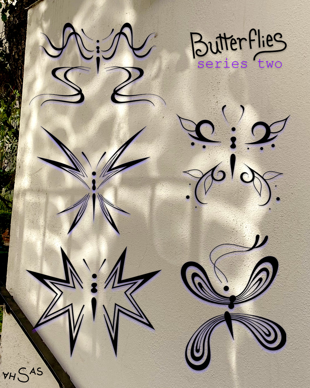 Collection of five stylized butterfly illustrations on a wall, part of 'Butterflies Series Two' art display.