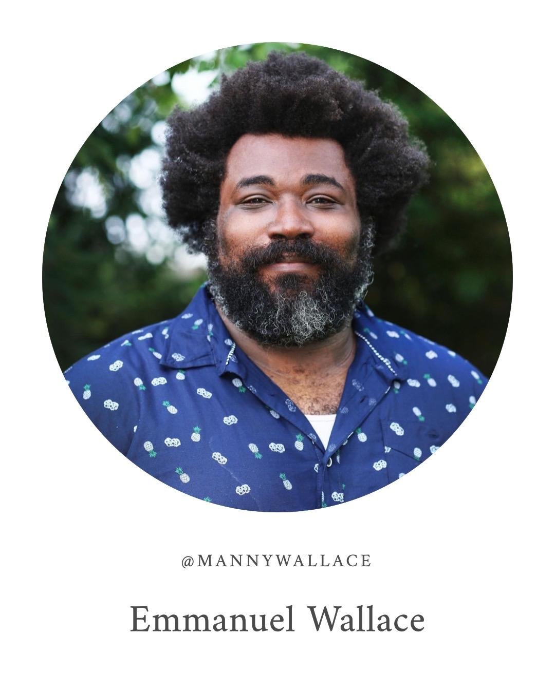 Portrait of Emmanuel Wallace with a beard and curly hair, wearing a blue shirt with a pineapple pattern, standing outdoors with greenery in the background.