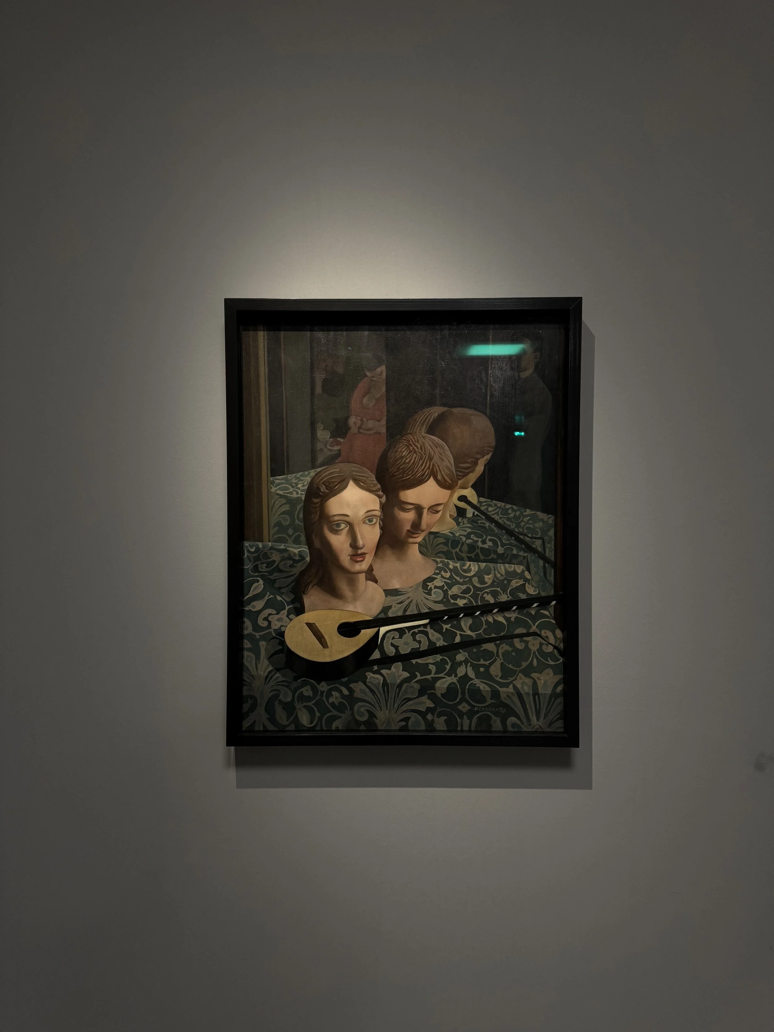 Painting of two women with vintage hairstyles, behind a glass case with a guitar on a decorative table.