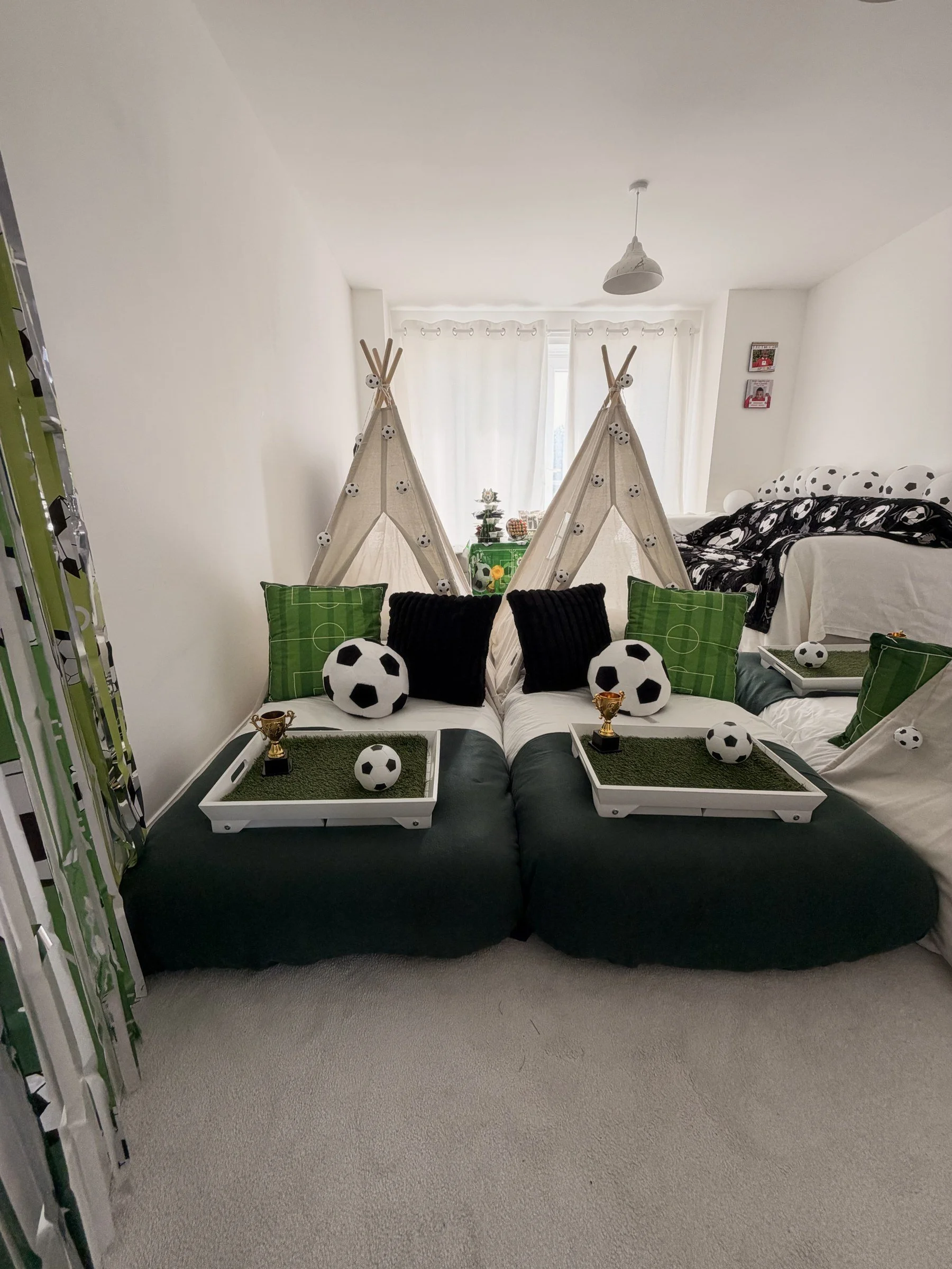 Boys football sleepover party hire in Southampton with teepees, football bedding and a styled treat table