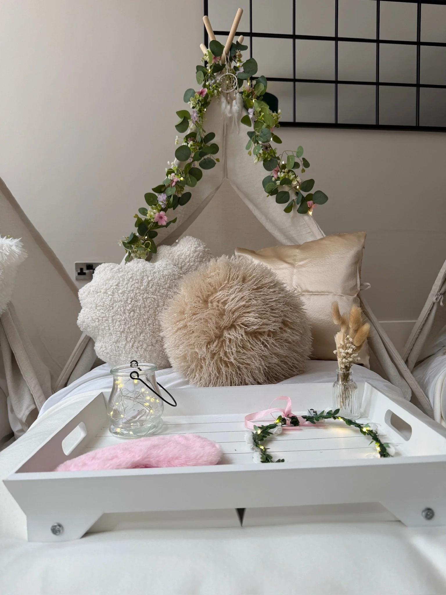 How to prepare your home for a teepee sleepover party in Surrey with boho theme setup and dreamcatcher garland