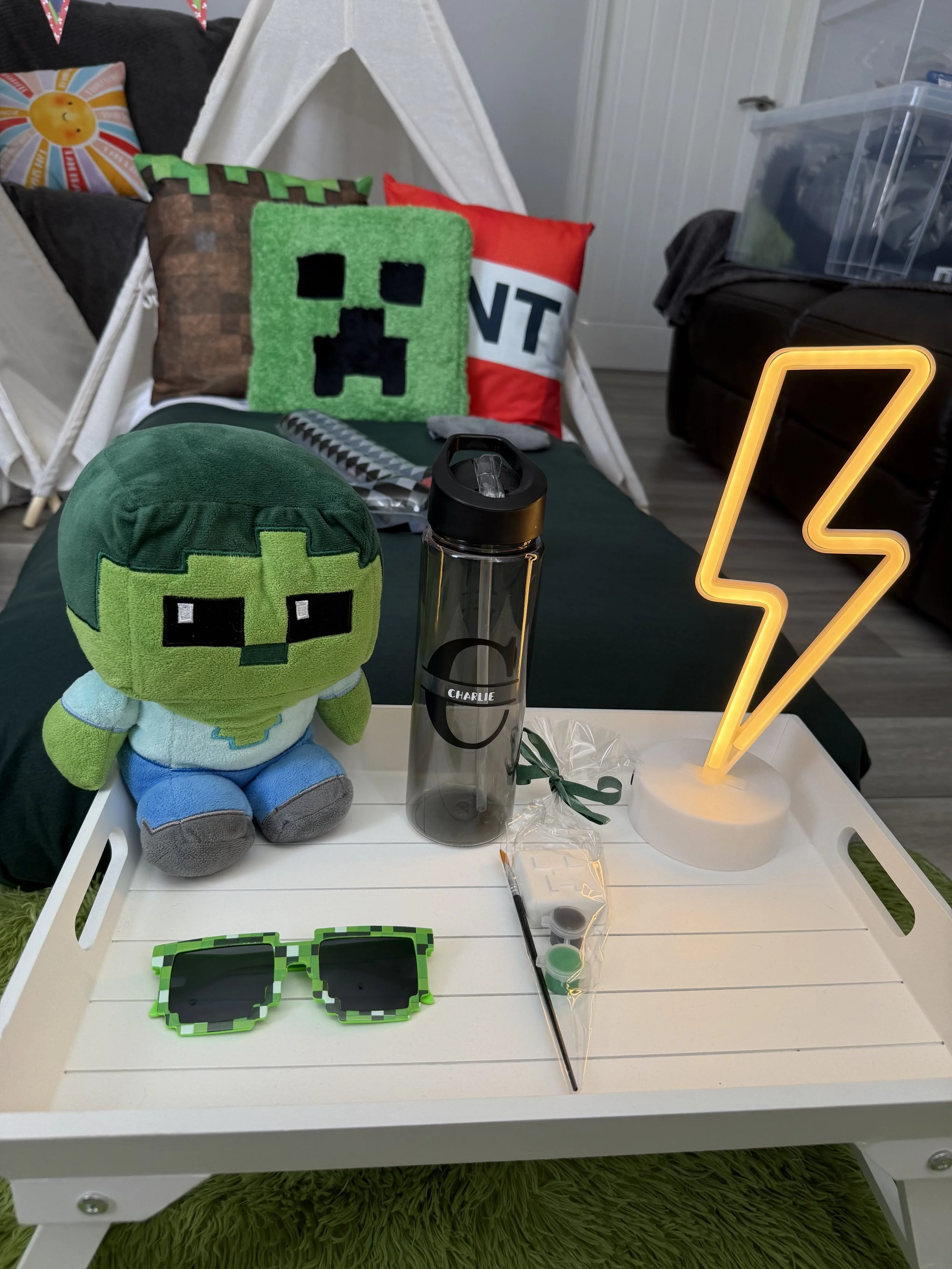 Minecraft sleepover party plush toy and personalised water bottle with a child's name in Surrey by Sweet Dreams Events