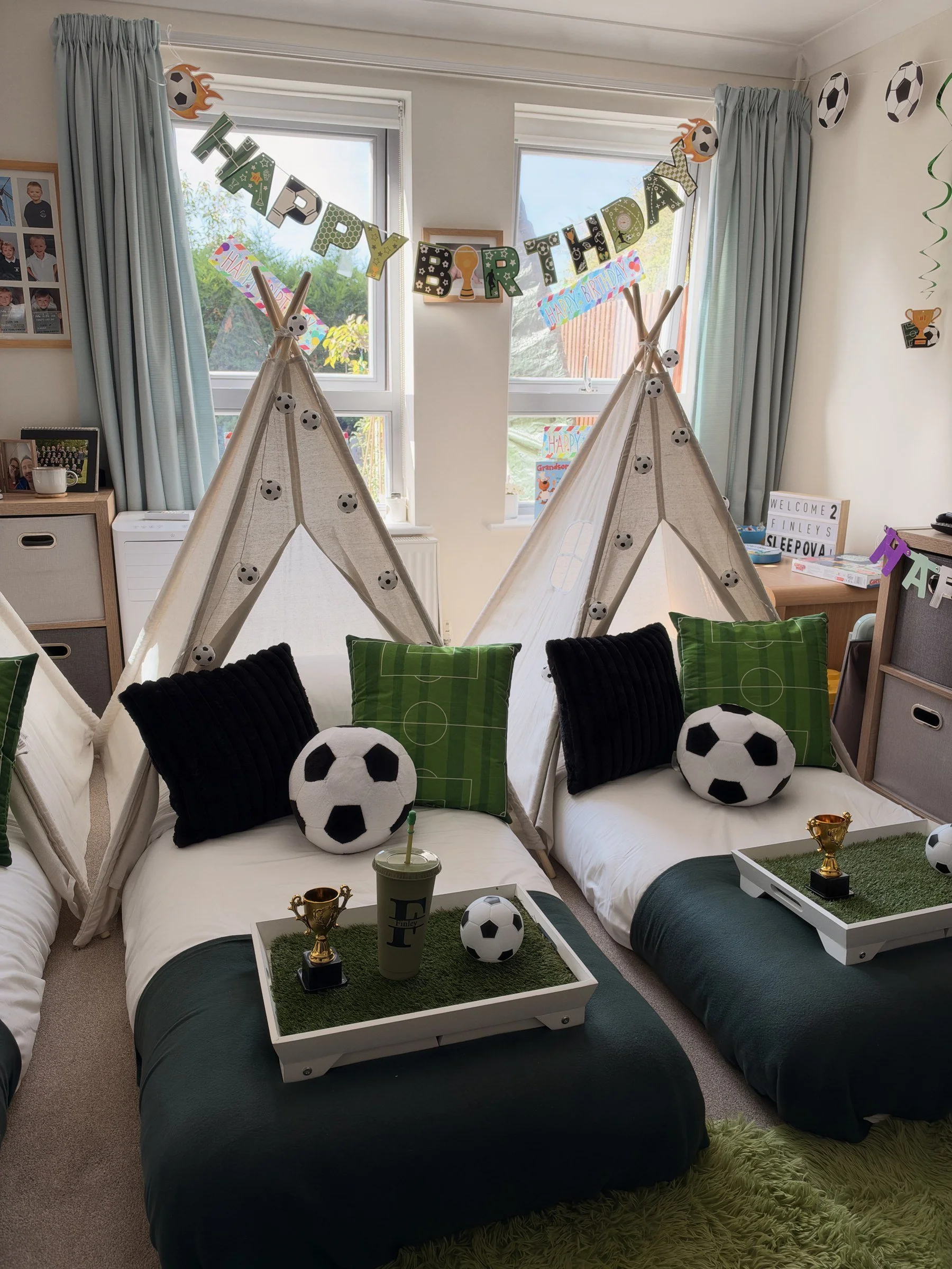 Match Day Magic football sleepover party for three, with teepees, trophies and grass trays in Winchester