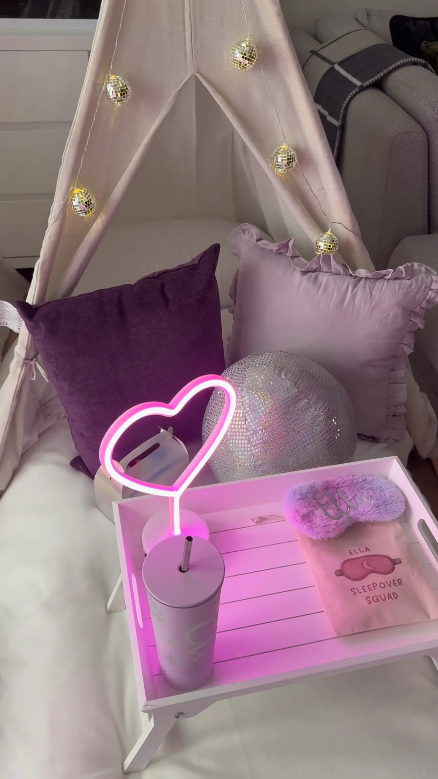 Disco sleepover party personalised tray in Surrey with pink neon heart and disco ball cushion