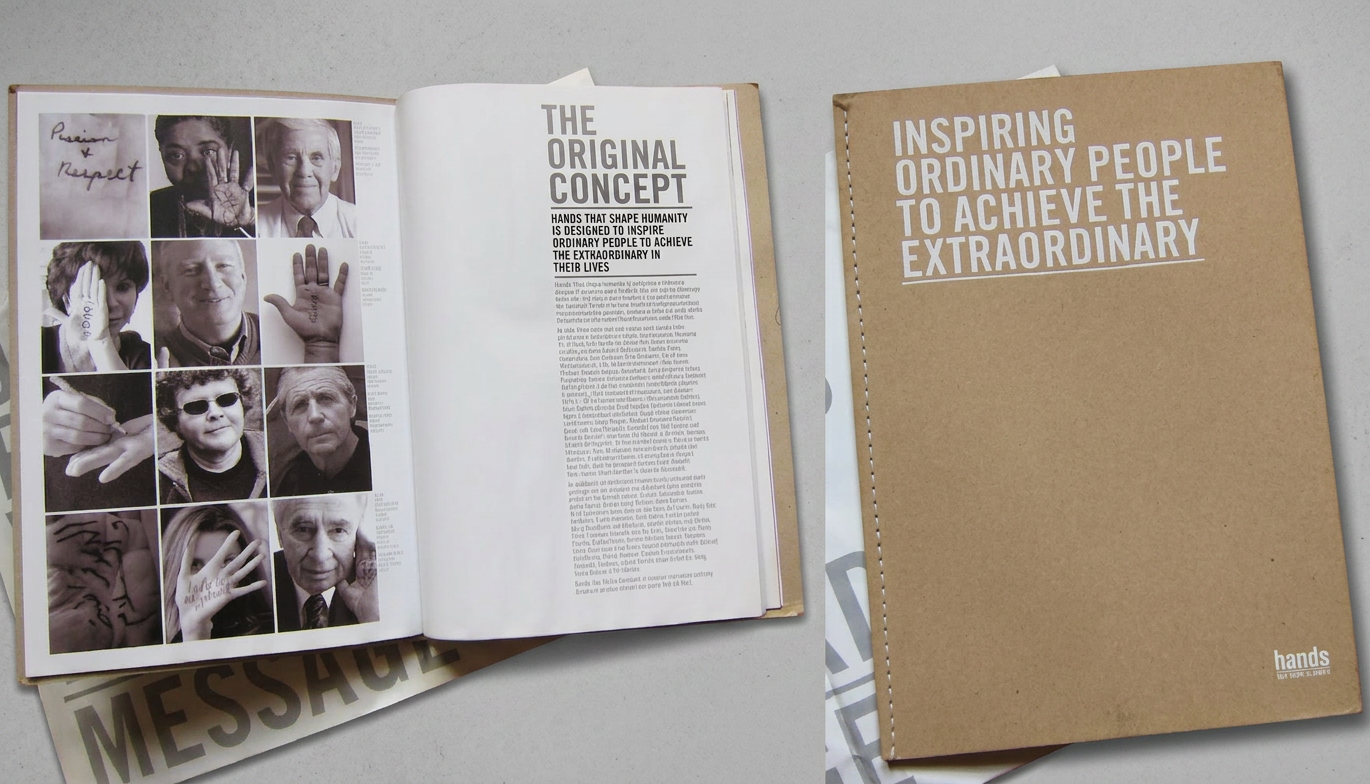 An open magazine displaying black-and-white photographs of people with their hands raised, some showing written messages, and a separate closed brown booklet titled 'Inspiring Ordinary People to Achieve the Extraordinary' with a smaller hands logo and slogan.