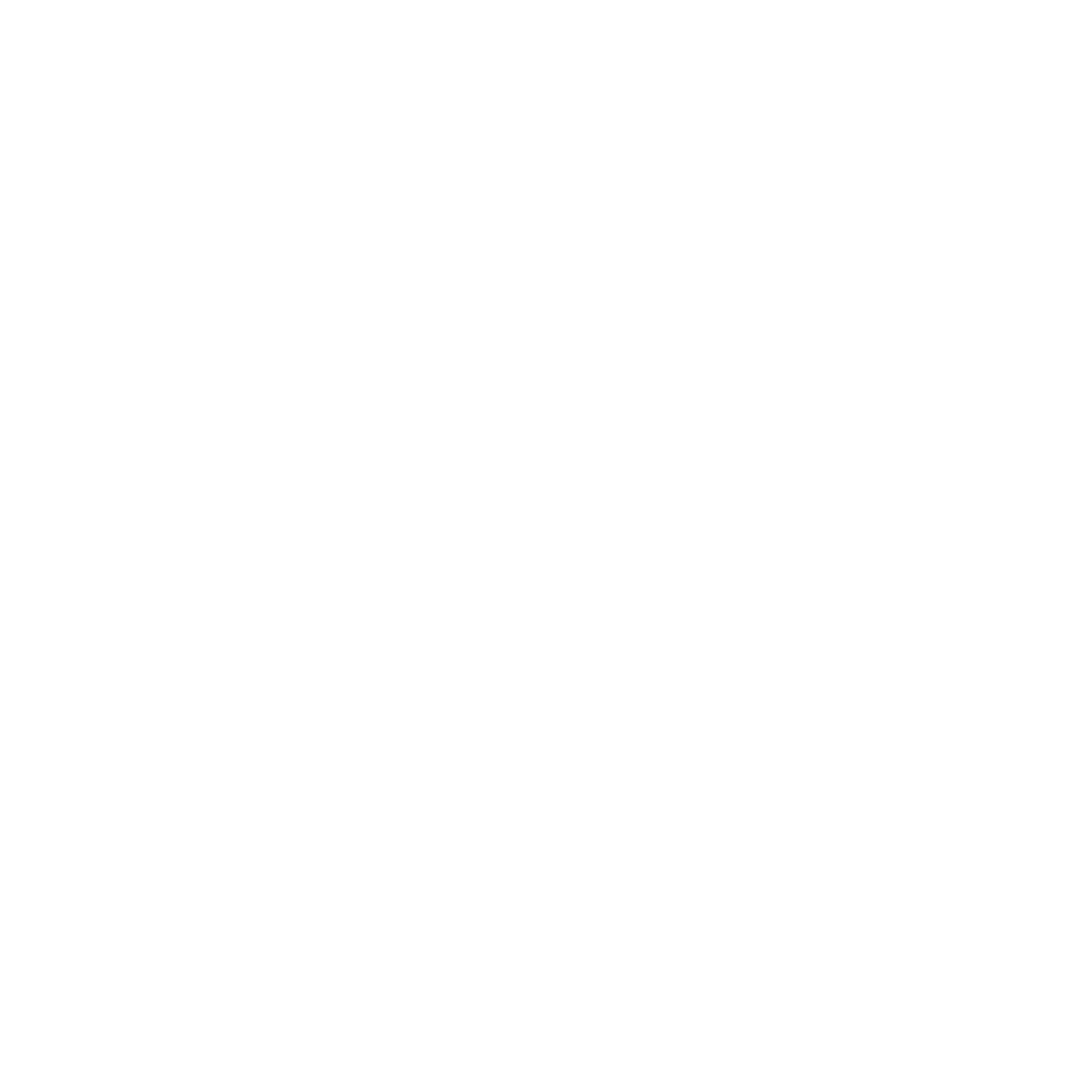 Construction crane lifting building materials at a construction site with partly built high-rise buildings.
